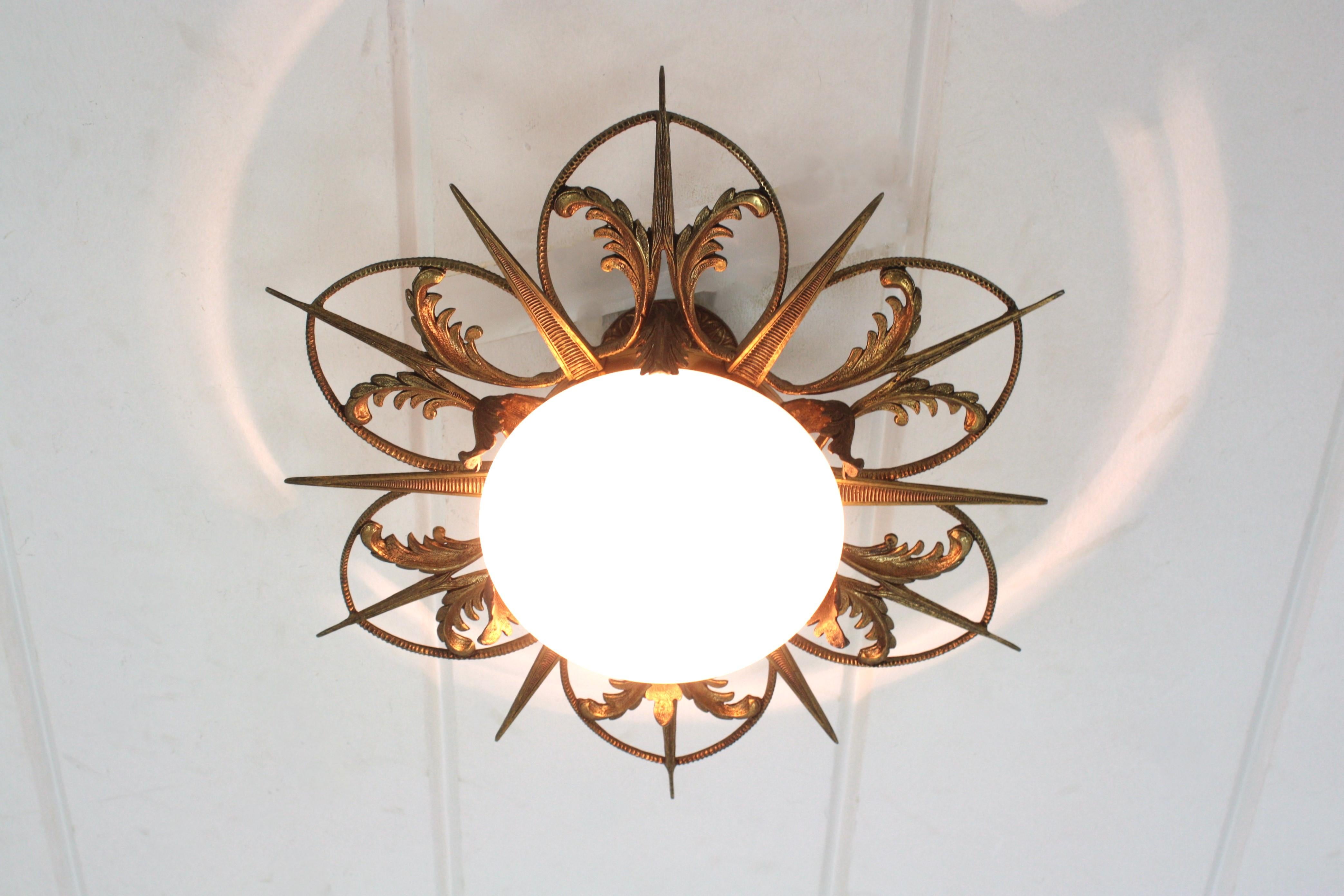 French Art Deco Sunburst Flower Flush Mount in Bronze and Milk Glass In Good Condition For Sale In Barcelona, ES