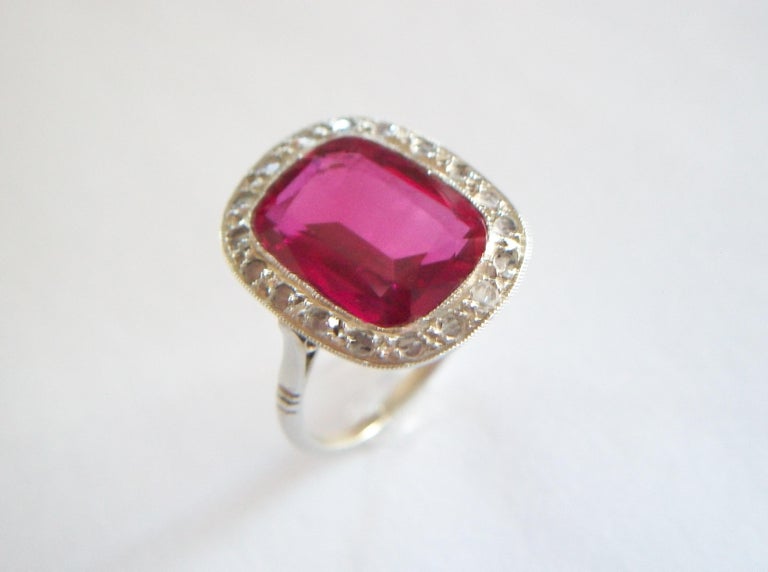 Emerald Cut French Art Deco Synthetic Ruby & Diamond Halo Ring, 18K Gold, Circa 1920's For Sale