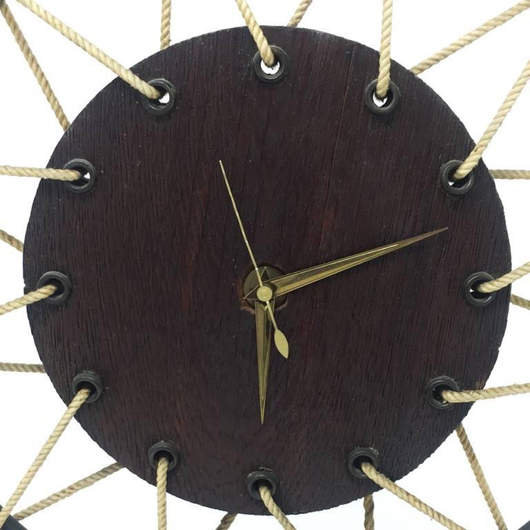 Astonishing French Art Deco table clock in wood, 1950.