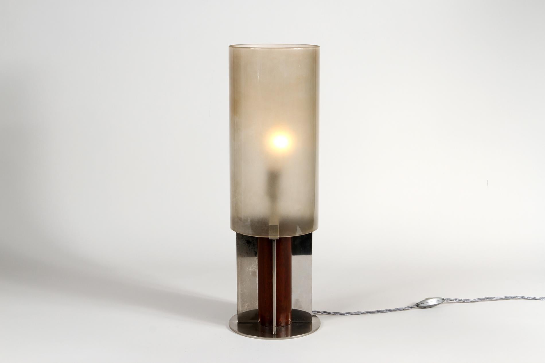 French Art Deco table lamp by Boris Lacroix. The lamp is with its original glass, the base is in nickeled bronze and wood and the signature is on the base. Really rare piece, has been rewired. 