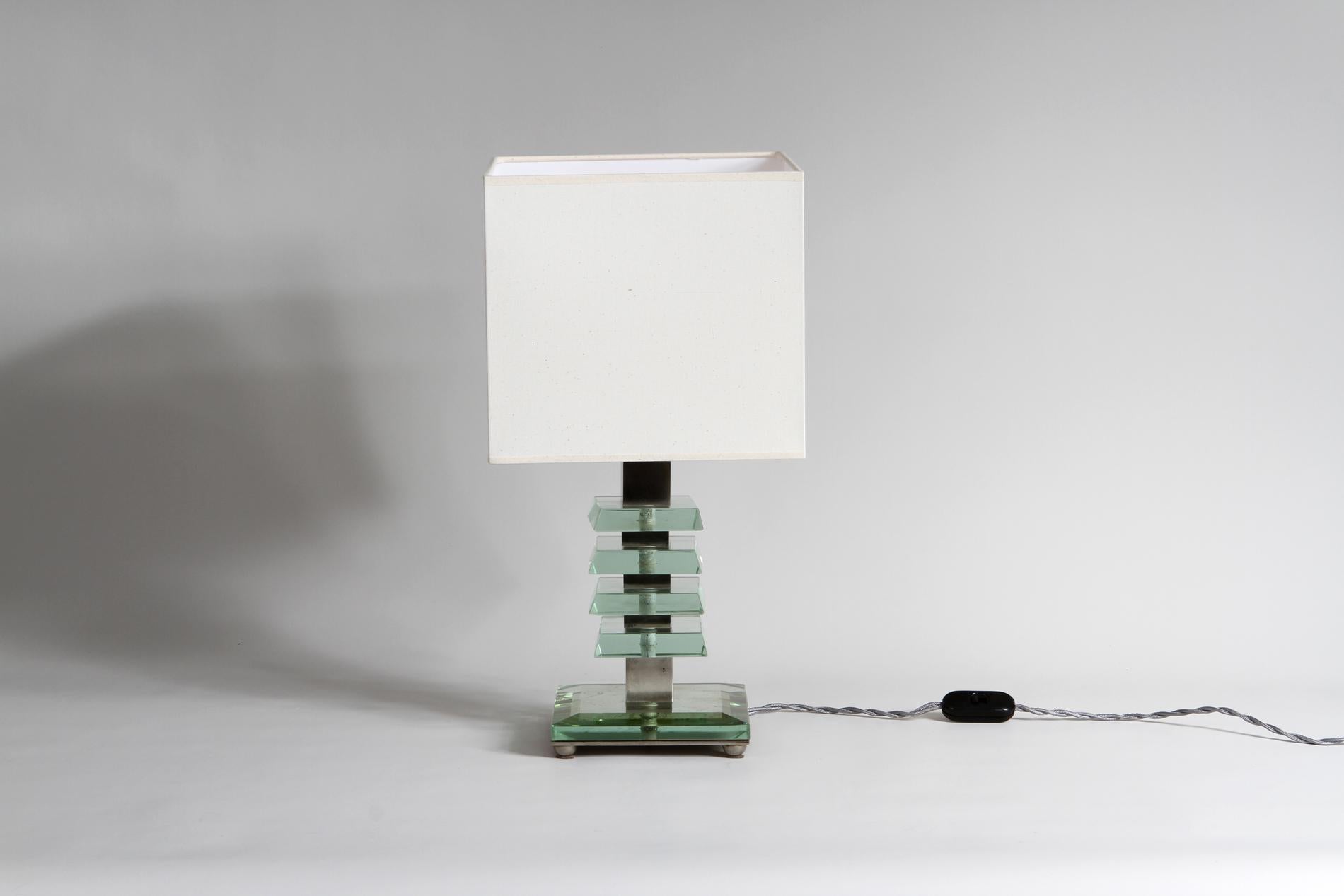 Modernist lamp by Maison Desny, consisting of 3 thick sheets of glass and nickel. Maison Desny was a leading Parisian Art Deco workshop, specializing in luxury modernist lamps featuring thick geometric glass and nickel-plated metal - stamped on the