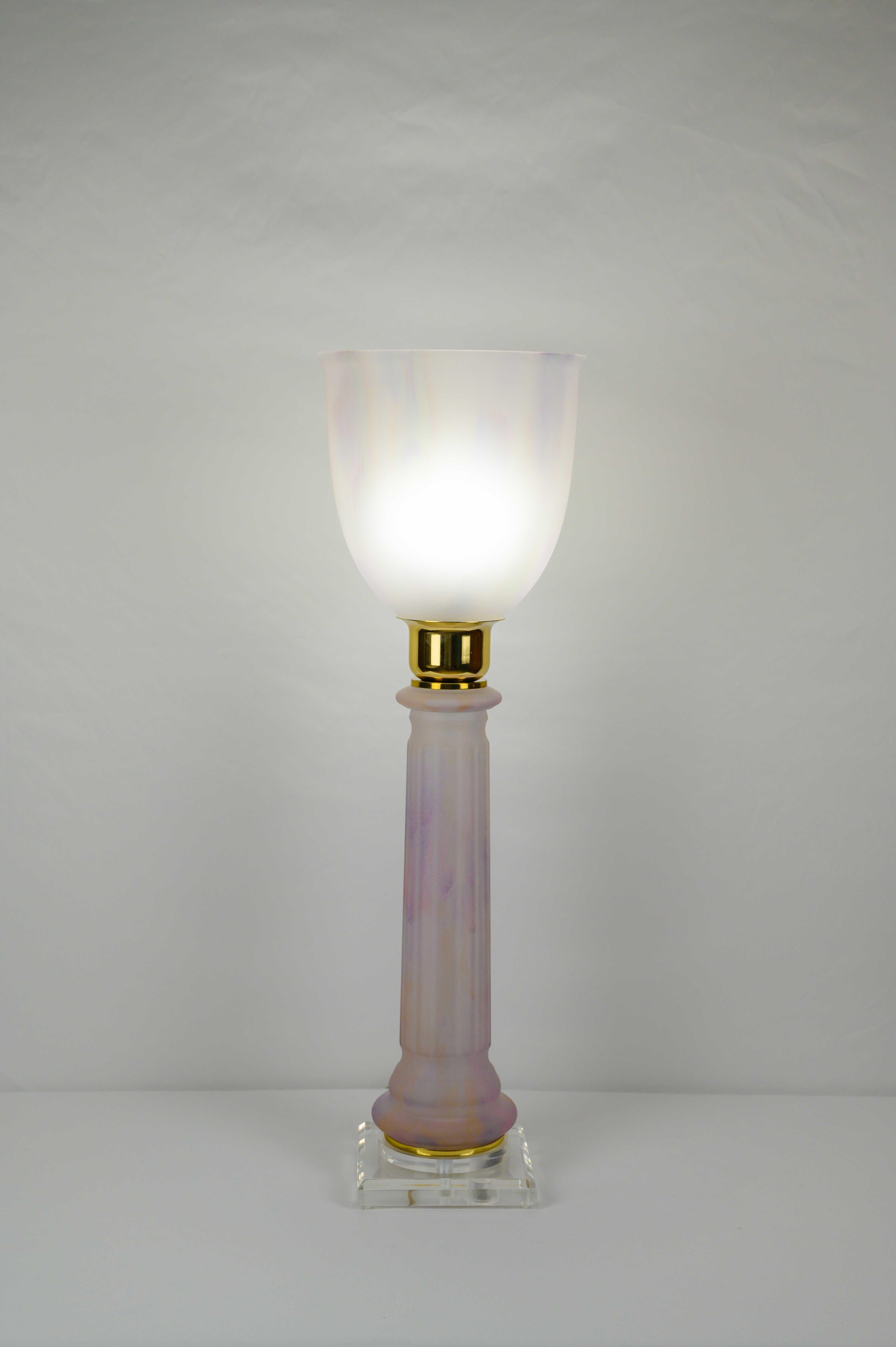 A fine quality table torchieres uplighter, made by Mazda, circa 1930s.

This beautiful French art deco table lamp by Mazda features a pale pink and pale white opaline glass shade with open top. Opaline base with brass detailing around the center of