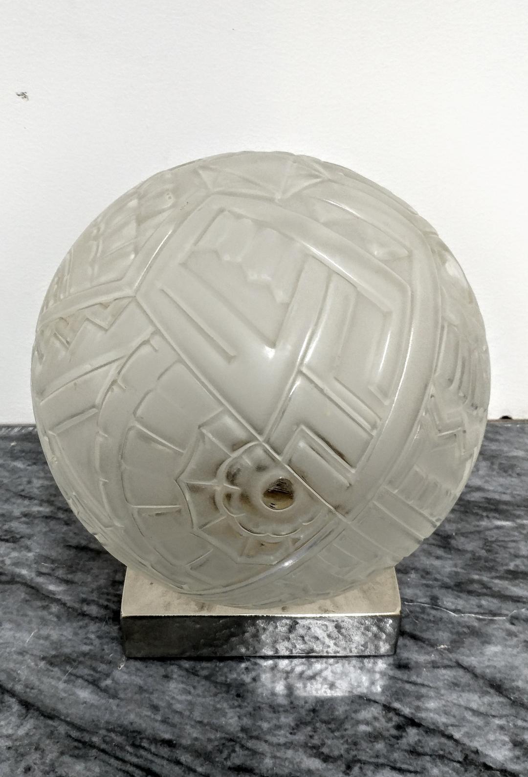 A French Art Deco table lamp created by the French Master 
