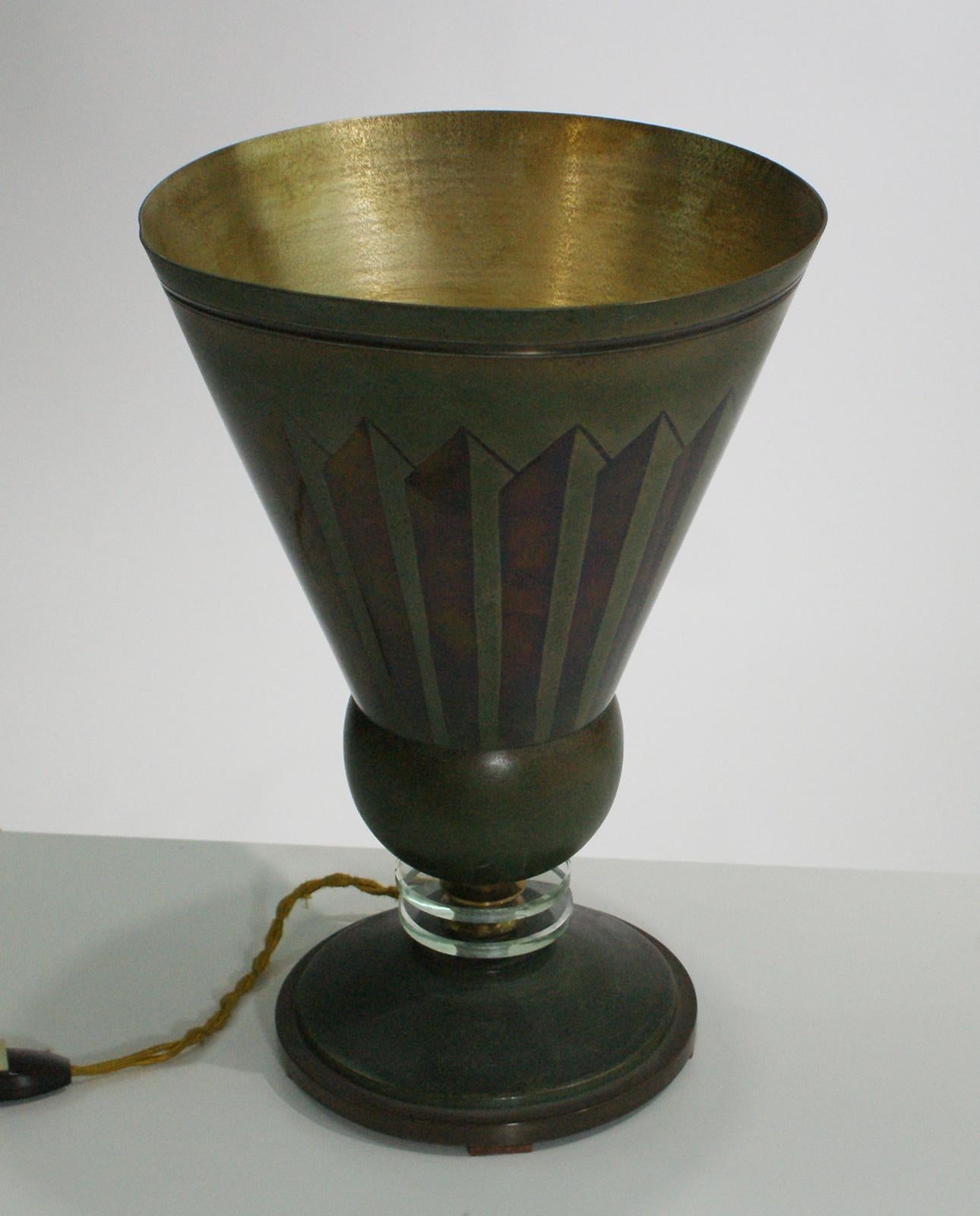 French Art Deco torchiere table lamp edited by Edmond Etling, France, 1930
in brass with a geometric design in two green tones and inside in brass color.
Bibliography: Le Luminaire, procédés d’éclairages nouveaux, Guillaume Janneau, Editor: