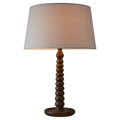 French Art Deco Table Lamp in Turned Oak, 1930s, Sculptural Design