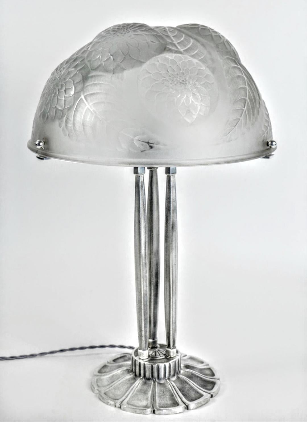 A French Art Deco table lamp created by French Glass Master R. Lalique model named 