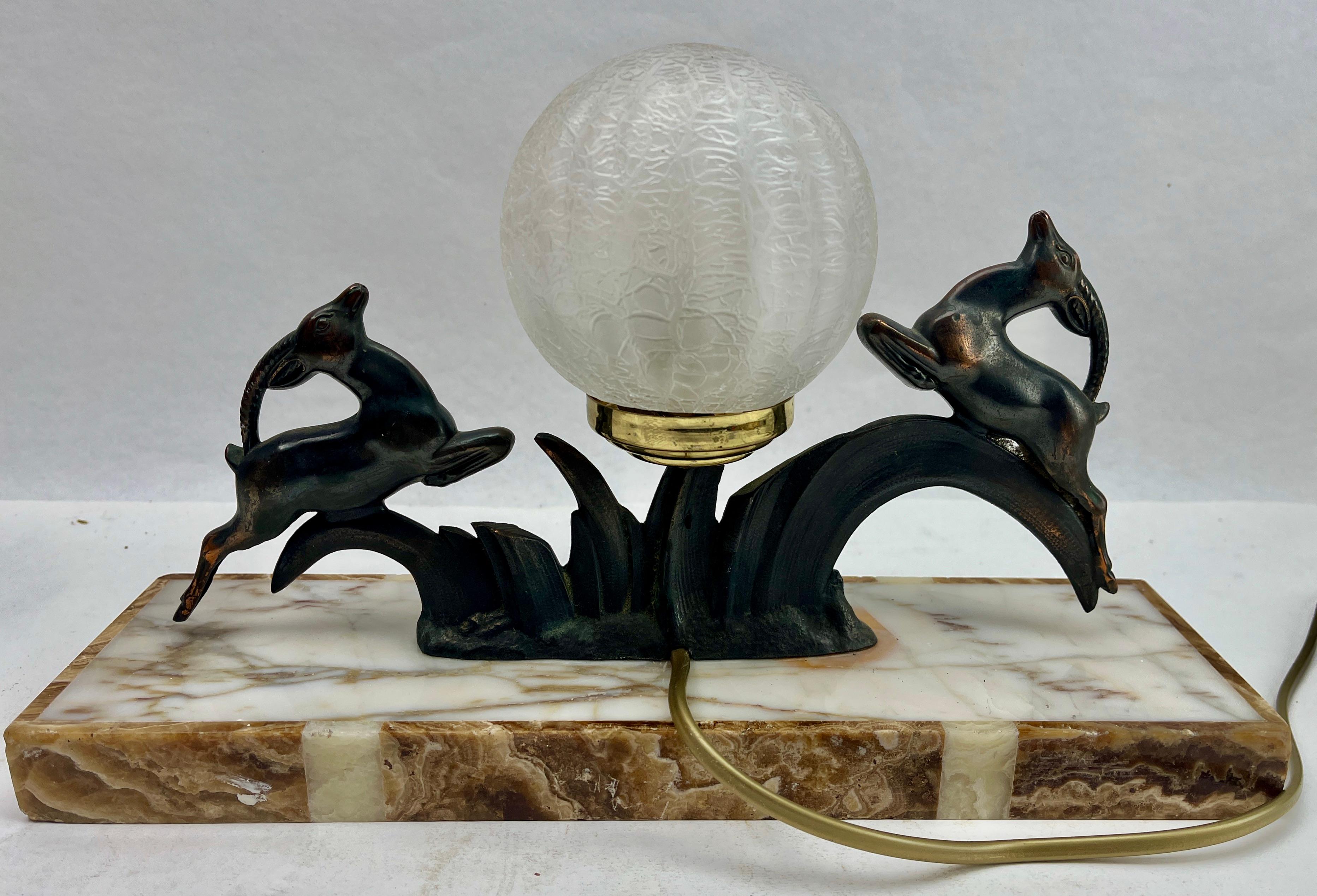 Hand-Crafted French Art Deco Table Lamp with stylized Spelter Representation of a Deer  For Sale
