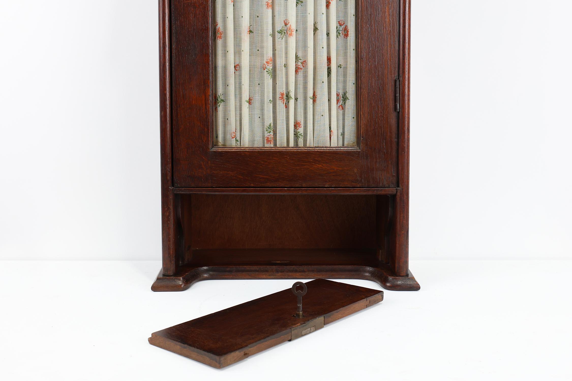 French Art Deco tall cabinet with glass door and hidden compartiment, ca. 1920 For Sale 7