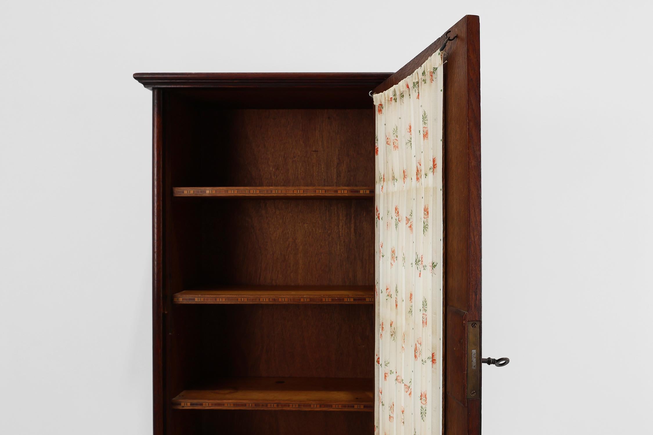 French Art Deco tall cabinet with glass door and hidden compartiment, ca. 1920 For Sale 1