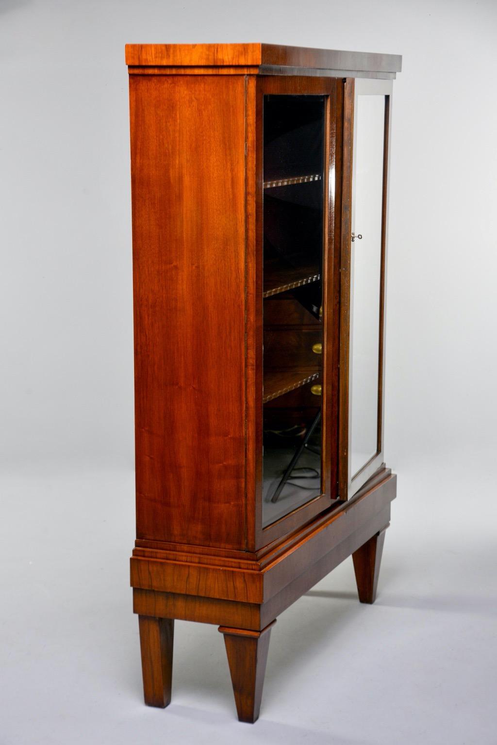 tall china cabinet with glass doors