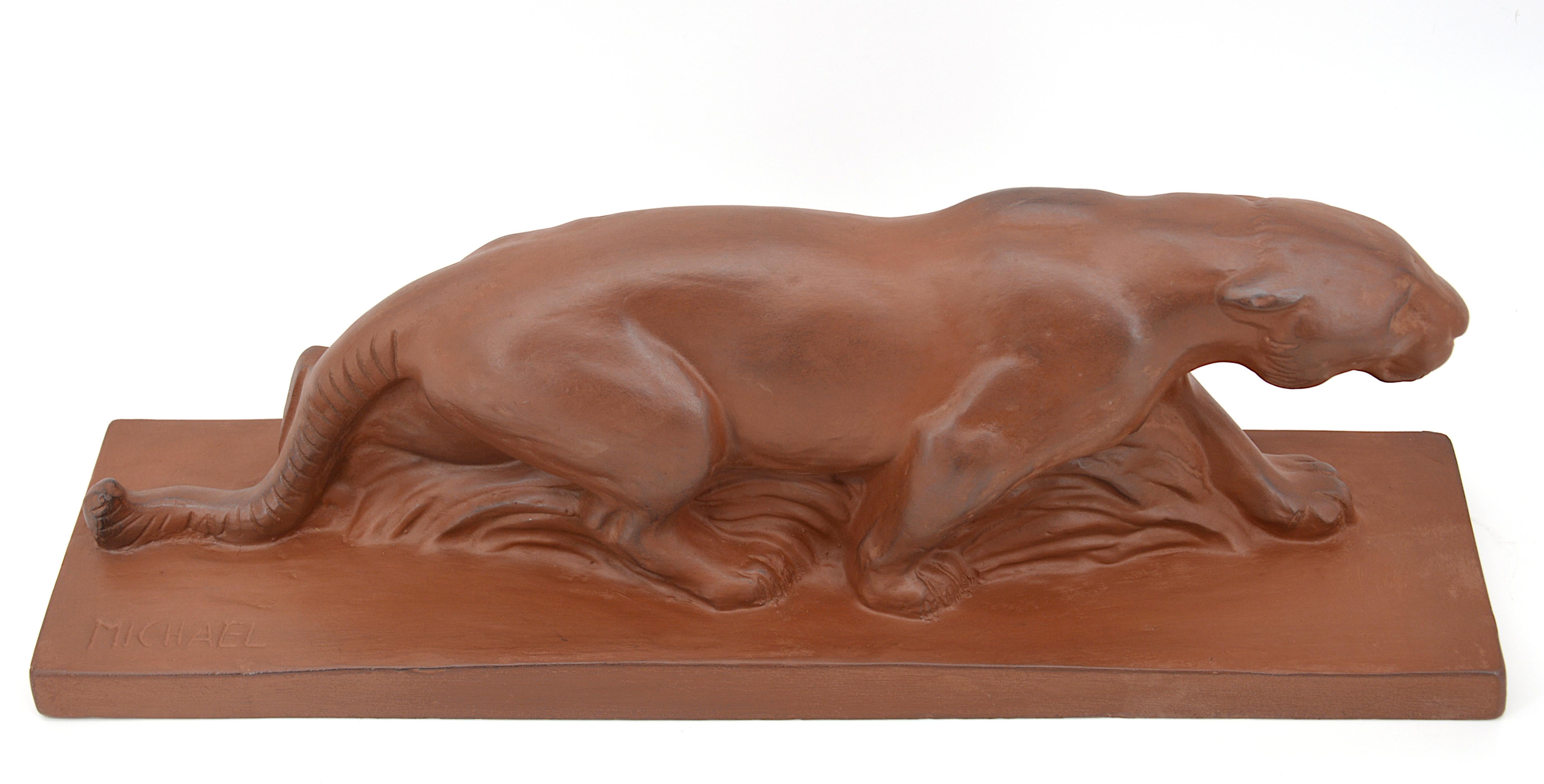 French Art Deco terracotta sculpture by Michael, France, 1930s. Lioness. Measures: Width 20.5