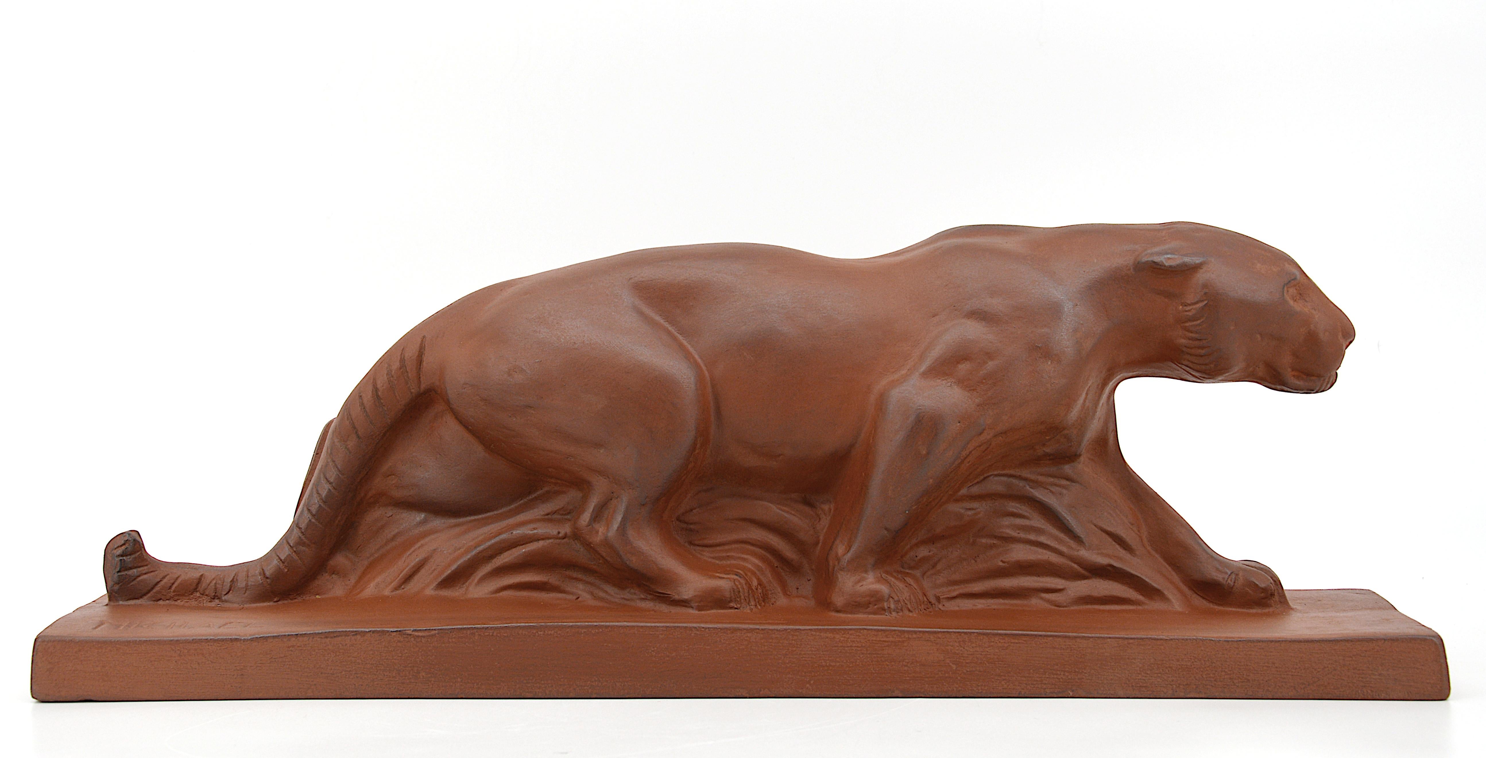 French Art Deco terracotta sculpture by Michael, France, 1910s. Lioness. Measures: Width 20.5