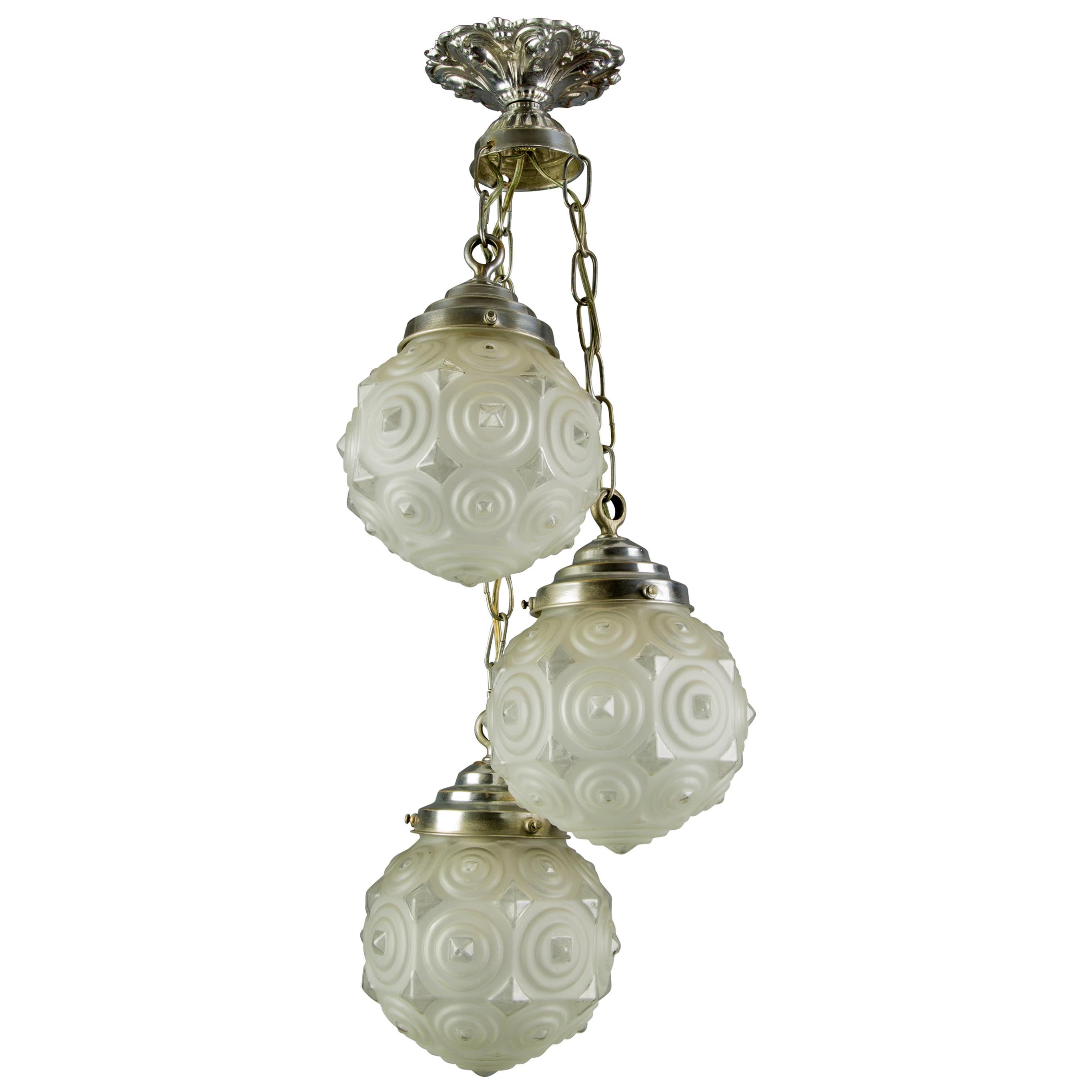 French Art Deco Three-Light Frosted Glass and Brass Cascade Pendant Light