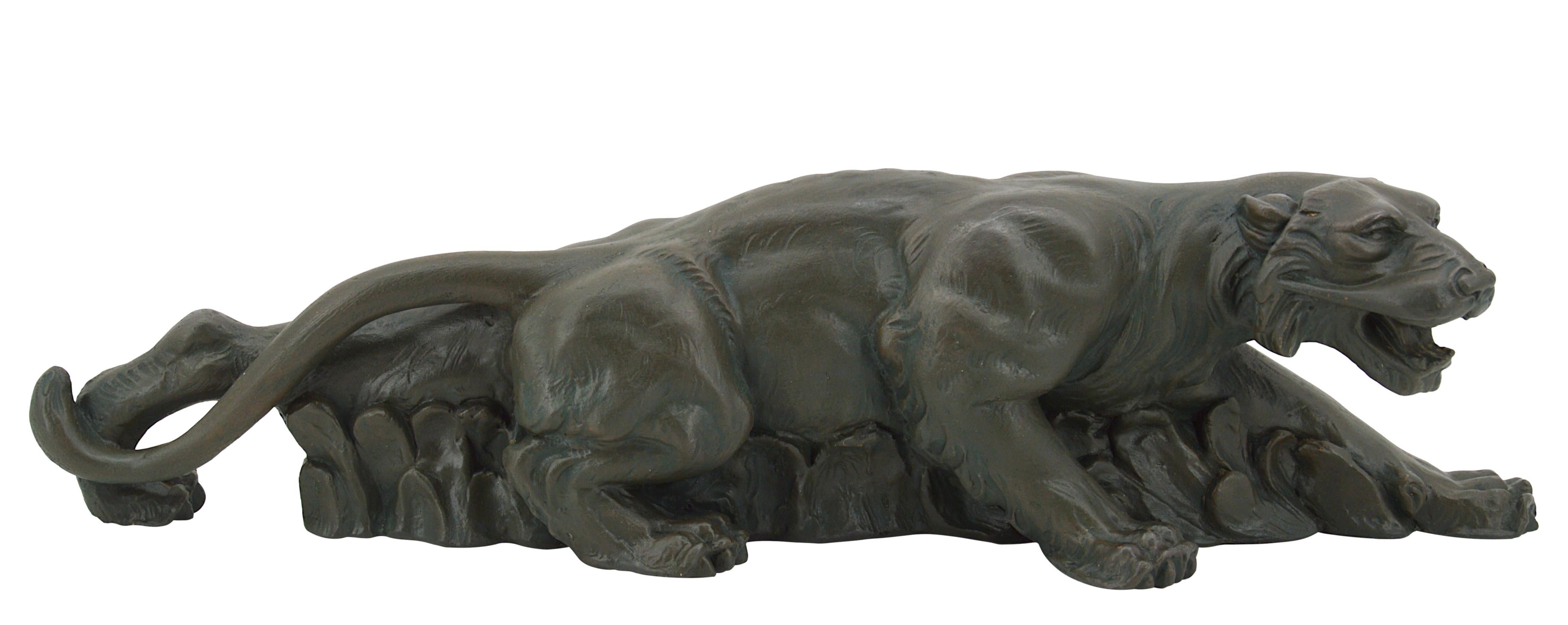 French Art Deco plaster tiger sculpture by Magnelli, France, 1900s. Tiger on the prowl. Old bronze patina. Measures: height : 5.1