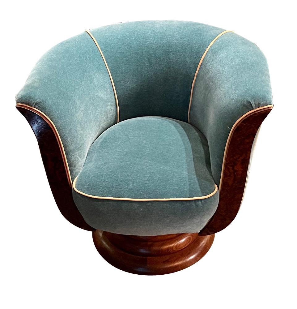 Art Deco Tulip Swivel club chairs. Originally, we bought them in France (the story is that they came out of a hotel). We made some changes, and adding the swivel to the base helped make them a tremendous hit. We were finally able to have the bases