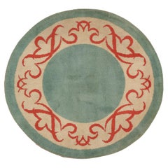 Tapis rond Art Déco français turquoise avec bordure ferronnerie, vers 1935