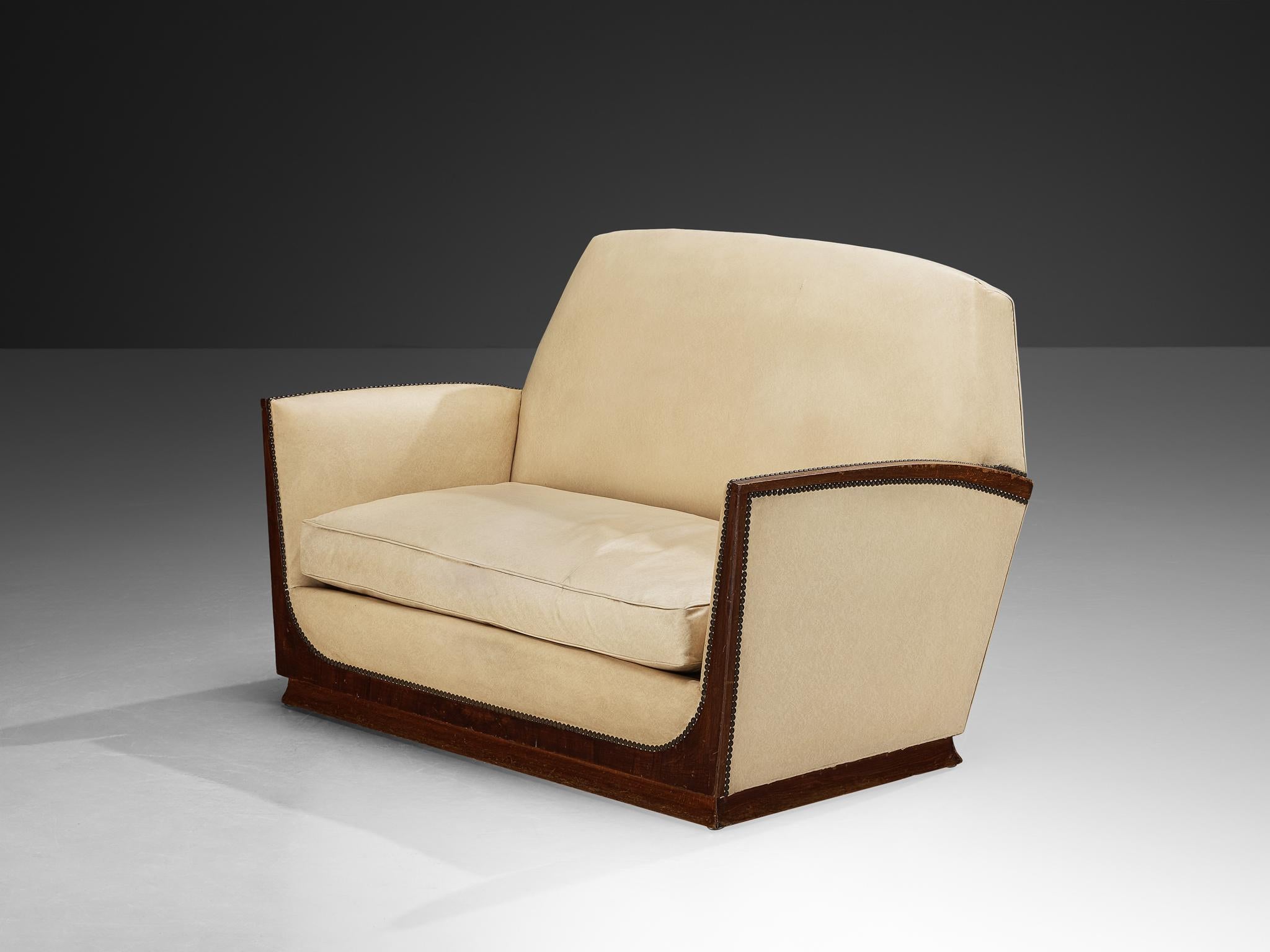 Sofa, walnut, faux leather, France, 1930s

This beautifully designed sofa was created during one of the most influential periods for the arts, namely the Art Deco Movement. The sofa originates from France and strongly resembles the aesthetics of
