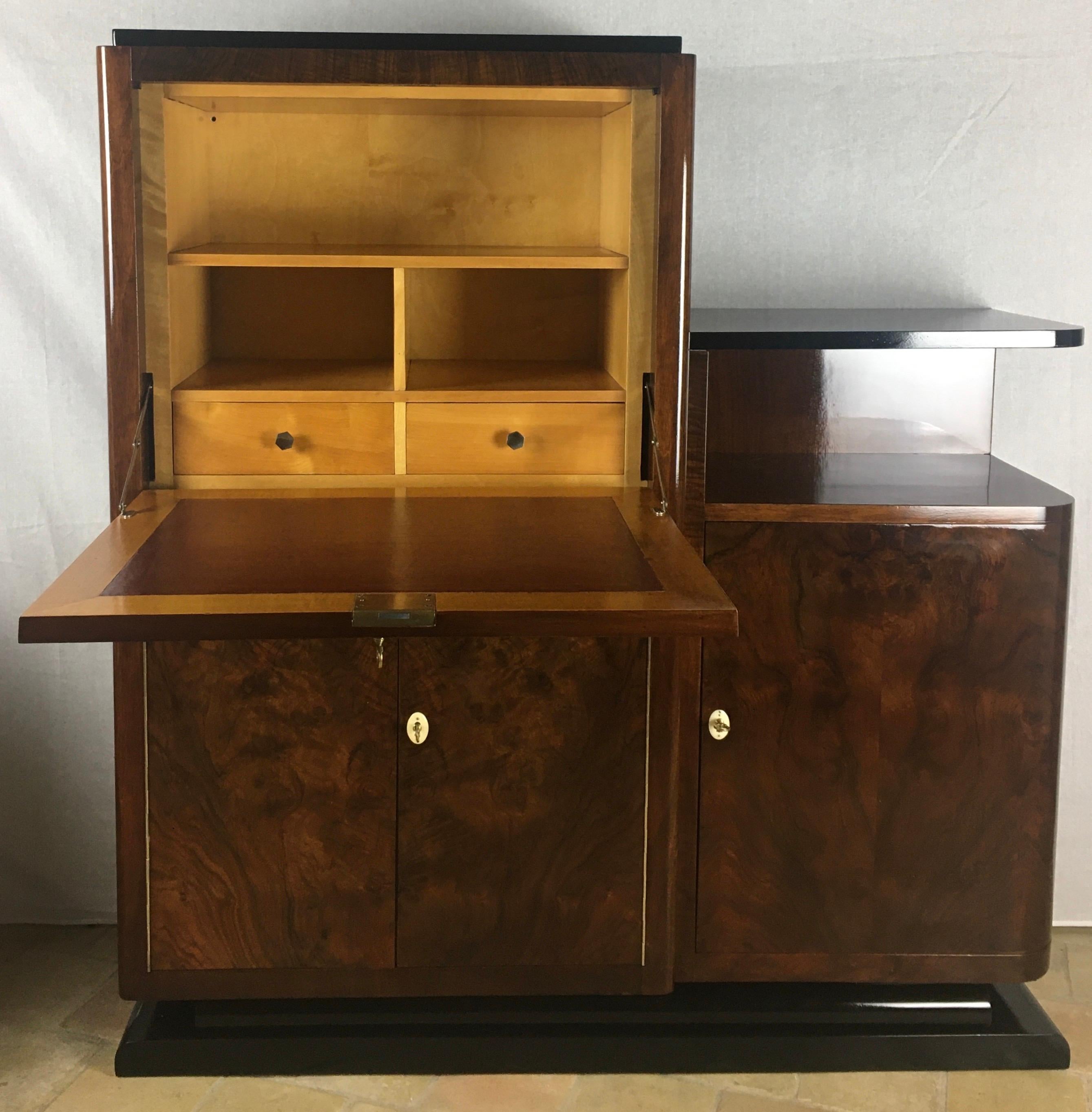 A truly rare and stunning French Art Deco two-tiered secretary desk. Originates from Nancy, France where in the height of the movement circa 1920-1940 most reputable furniture makers established their businesses.

This secretary makes a wonderful
