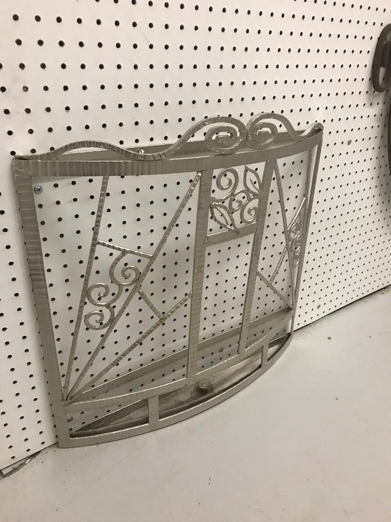 French Art Deco umbrella stand. Having a gorgeous wrought iron frame that has been re plated in polished nickel. Having beautiful deco details throughout.