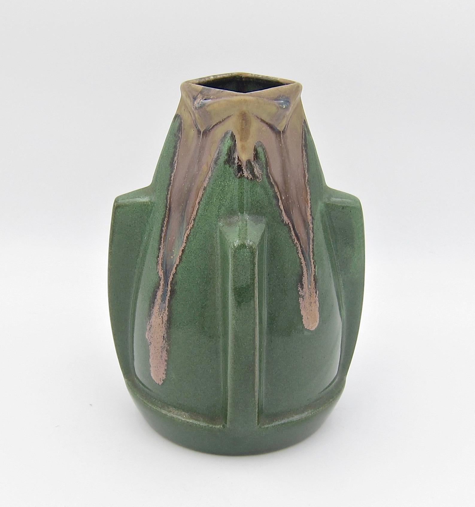 An Art Deco art pottery vase from la Société Denert et Balichon -- Denbac Pottery -- of France, dating circa 1930. Denbac's grès flammés or flamed sandstone art pottery decorations are unique to every piece; this vase features a drip glaze in shades