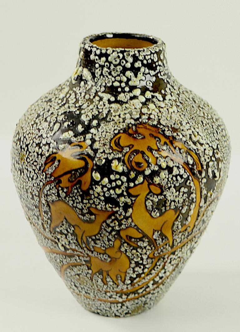 Very well made Art Deco vase having textured glaze and a deer and fawn motif. In the style of Jean Besnard, and Primavera, but not signed. No damage, flaws or repairs.