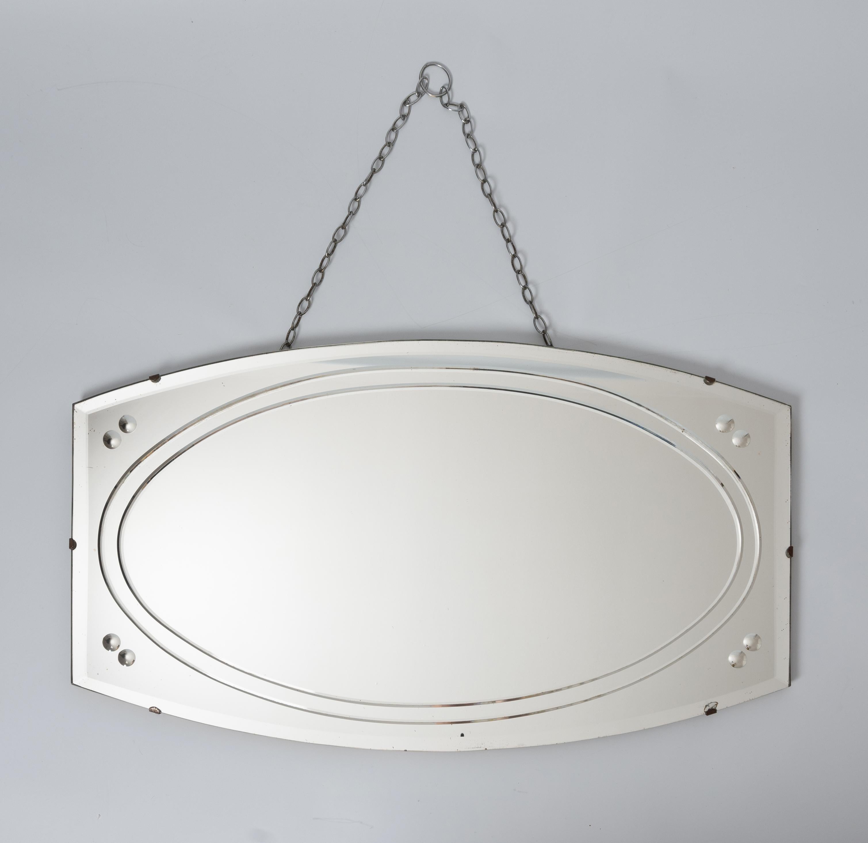 French Art Deco Wall Mirror C.1930
Etched detailing with reverse cut optics in the four corners.
In good condition commensurate with age (please refer to photos).