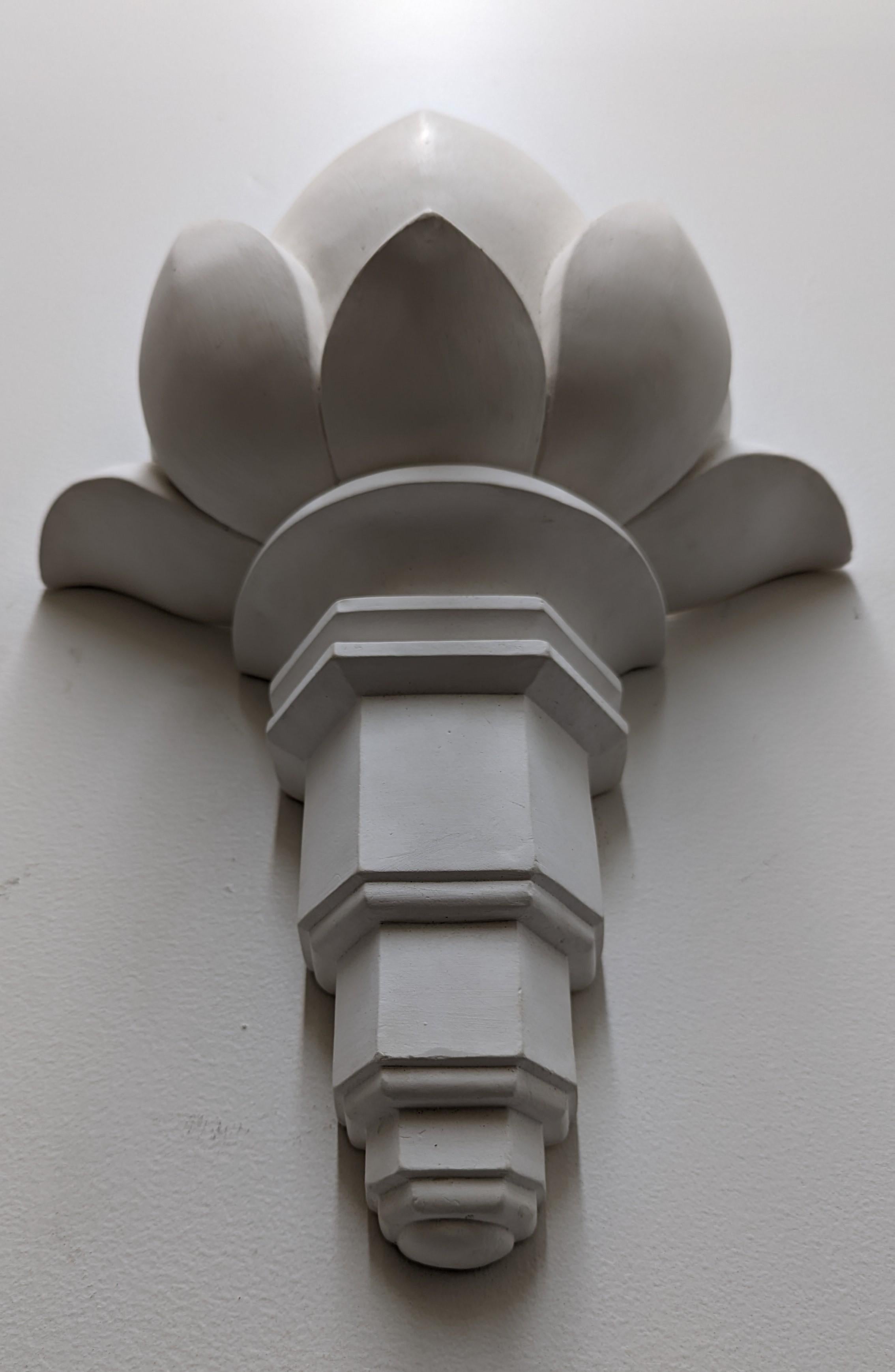 A pair of elegant French Art Deco hand carved plaster wall sconces contemporary design by Bourgeois Boheme Atelier in the shape of a torch. Each sconce uses a candelabra based bulb, Max wattage 60 each. Dimensions: 16