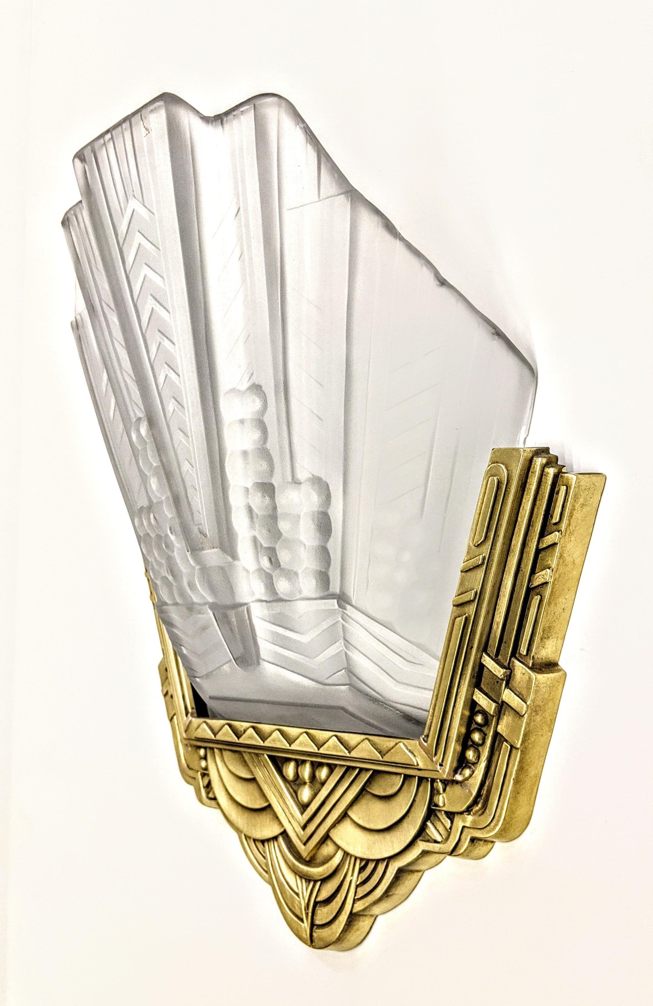 Pressed Pair of French Art Deco Wall Sconces by E.J.G For Sale