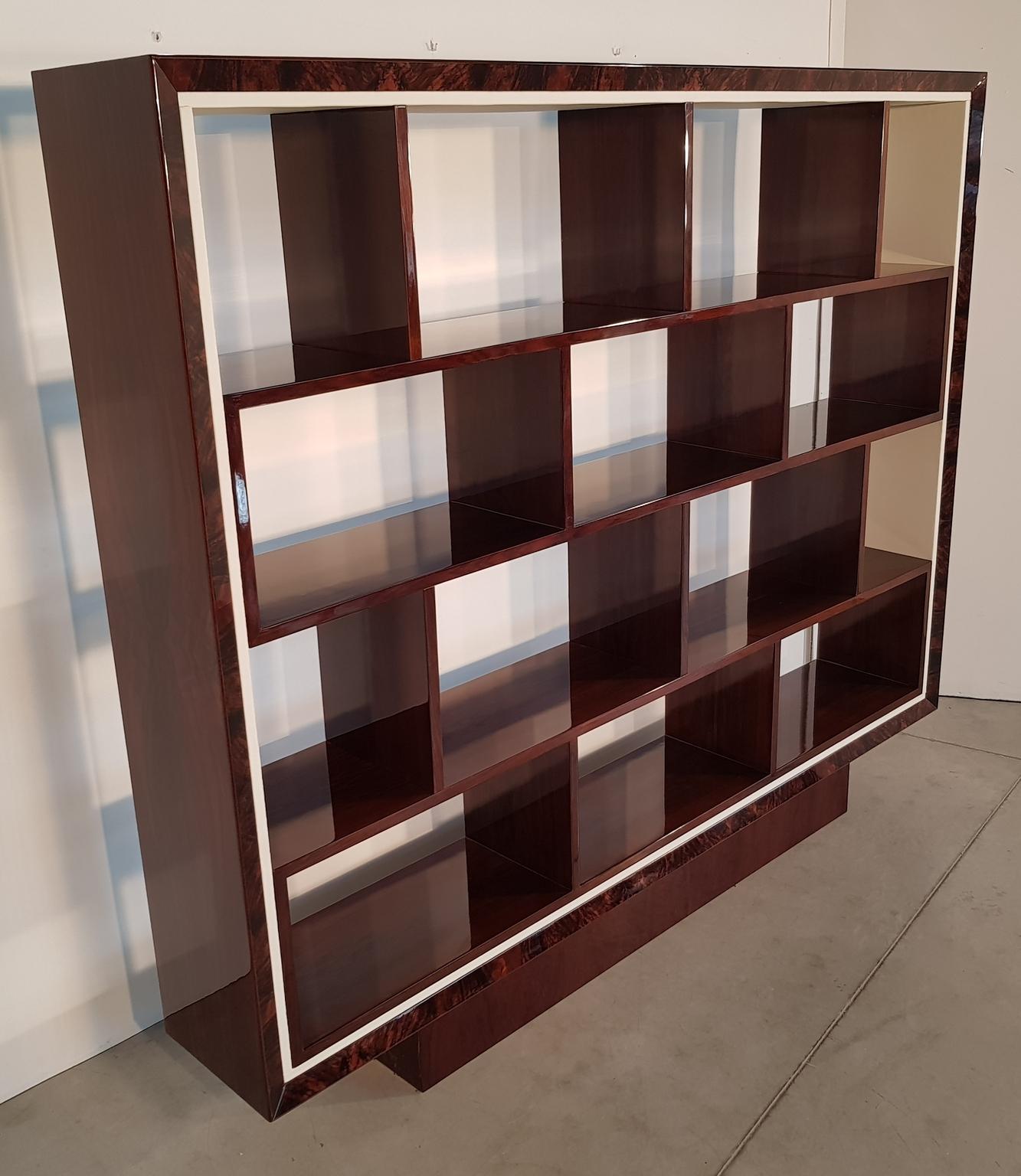 Art Deco bookcase with amazing combination lacquered walnut/walnut burl veneer and white leather covered parts, France, 1940s. Recently restored.