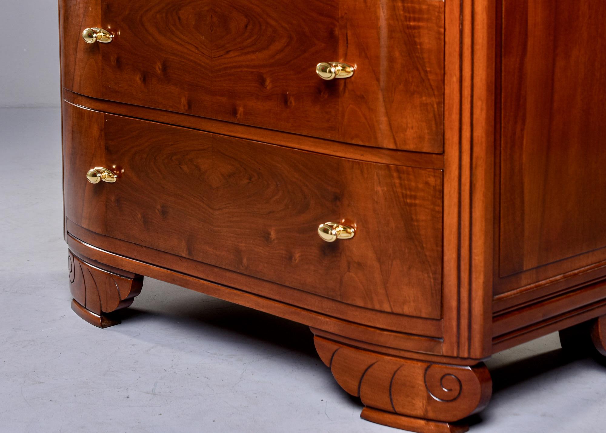 French Art Deco chest of three drawers in walnut burl veneer, circa 1930s. Curved and carved feet and new polished brass hardware. Versatile size can be used to flank a bed or sofa. Unknown maker.