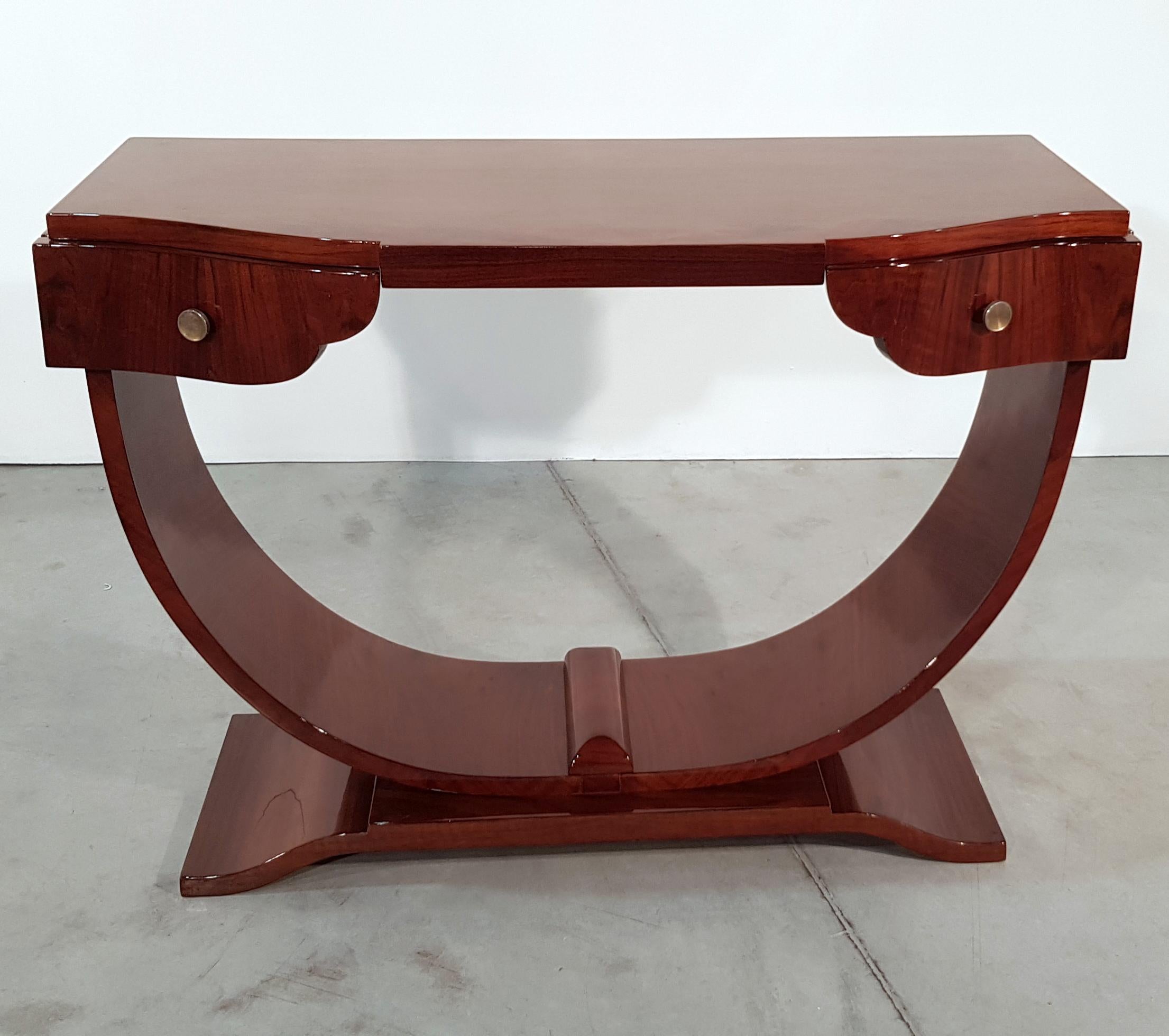 High shiny lacquered walnut veneered console table with two drawers and U-shape legs. Original handles. France, 1930s. Recently restored.