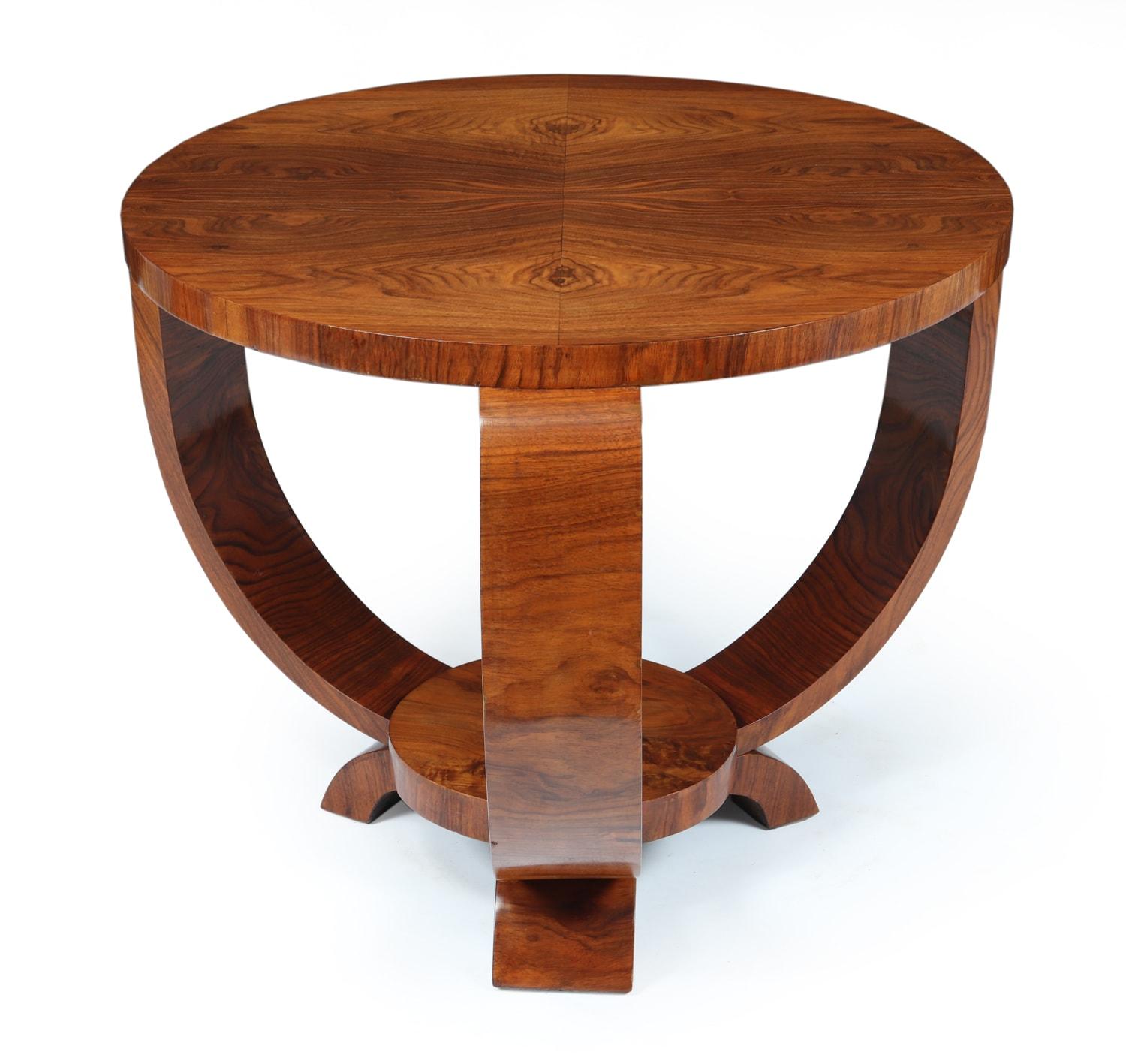 French Art Deco walnut table, 1930

A circular walnut center coffee table with three curved shaped uprights, lower tier shelf fully restored and French polished by hand
Age: 1930
Style: Art Deco
Material: Walnut
Origin : France
Condition: