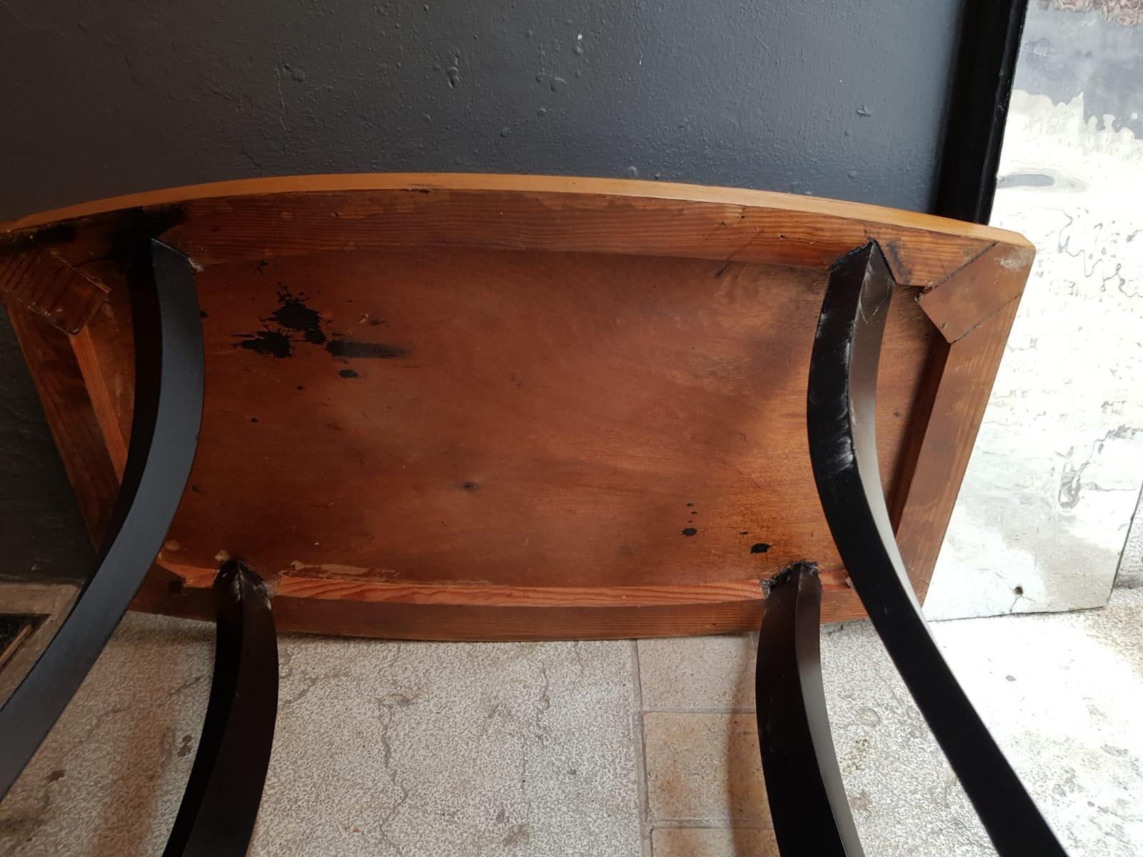 French Art Deco walnut wood small side table or coffee table. From 1930s period this table features black ebonized details such as legs and spherical feet.
This table has been restored in conservative way. Size: W 65 cm, D 39 cm, H 63 cm – 25.59