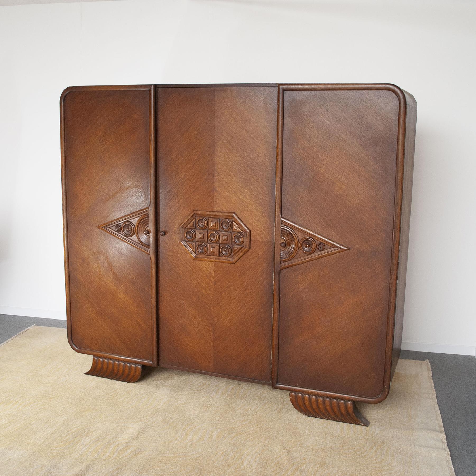 Original wardrobe consisting of three doors embellished with Art Deco style inlay designs, probably French production from the 1940s.