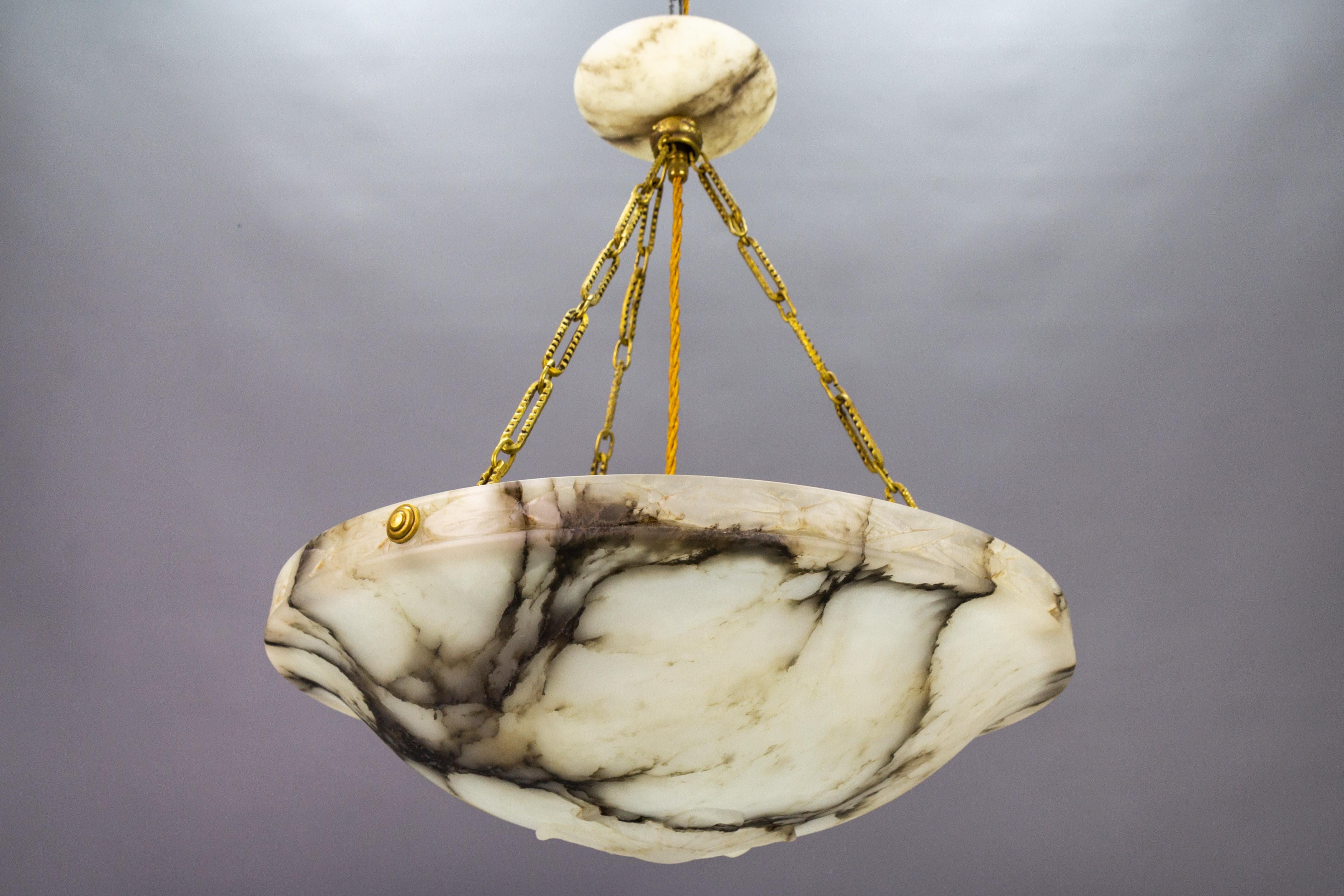 Early 20th Century French Art Deco White and Black Alabaster and Brass Pendant Light, ca 1920 For Sale