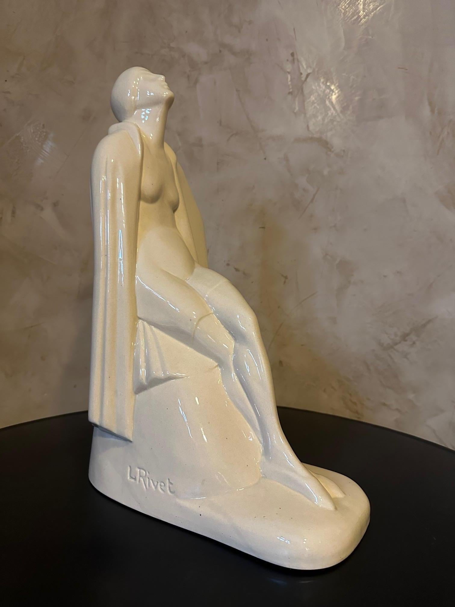 Very beautiful art deco statue in cracked ceramic representing a woman coming out of the bath. Signed Louis Rivet on the base. 
Very good quality and large size. For art deco lovers.
​