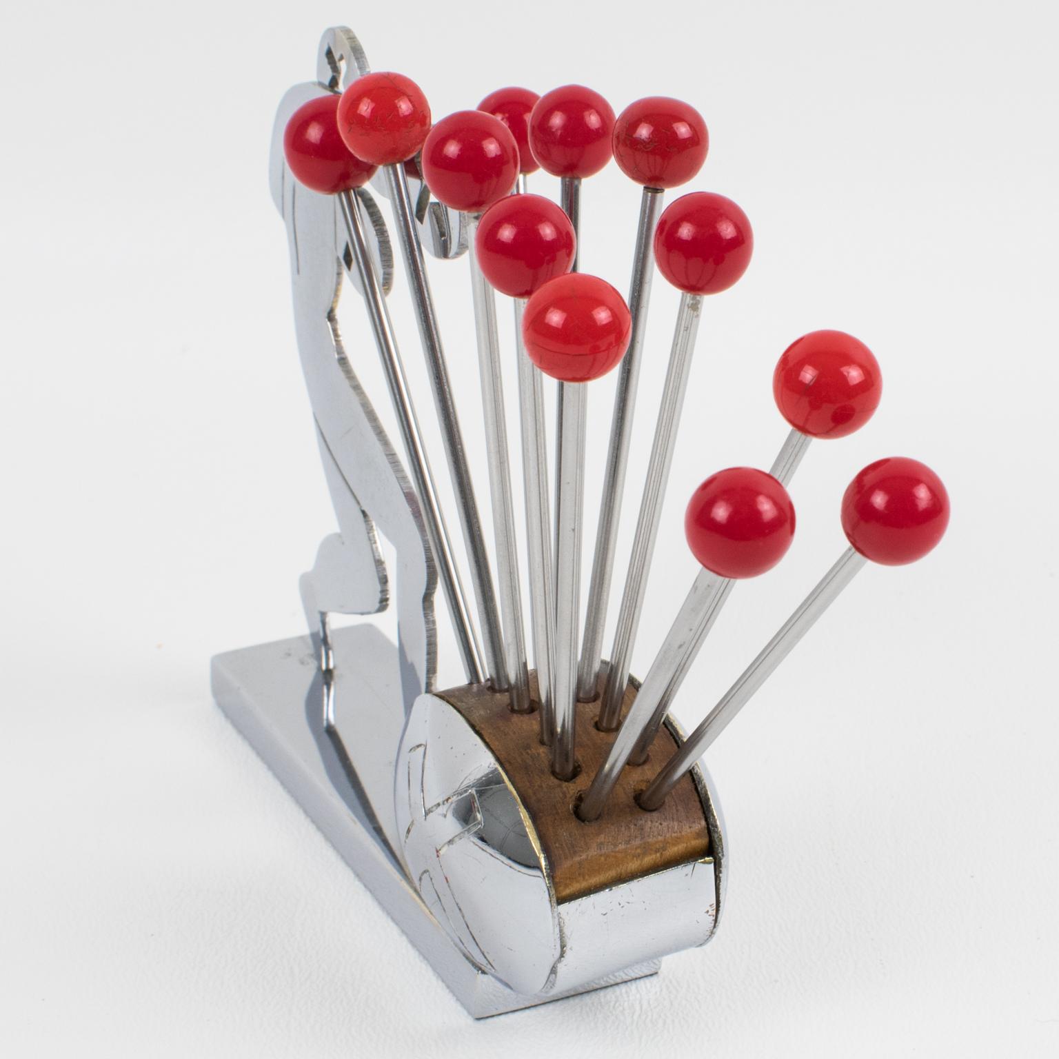 Stunning barware bar set cocktail picks. This wonderful French Art Deco bar set is made of wood and chromed metal and features a fighting boxer with 12 metal cocktail picks with red hard plastic bead finial. This set is very stylish, a great