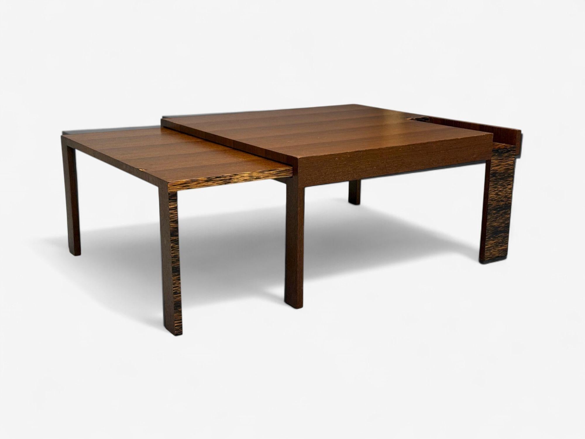 French Art Deco, Wood, Palm Veneer, Expandable Coffee Table, France, 1960s

An interesting coffee table designed and produced in France, circa 1960s. This example is fitted with a sliding extension, crafted in exotic and palm wood veneers and