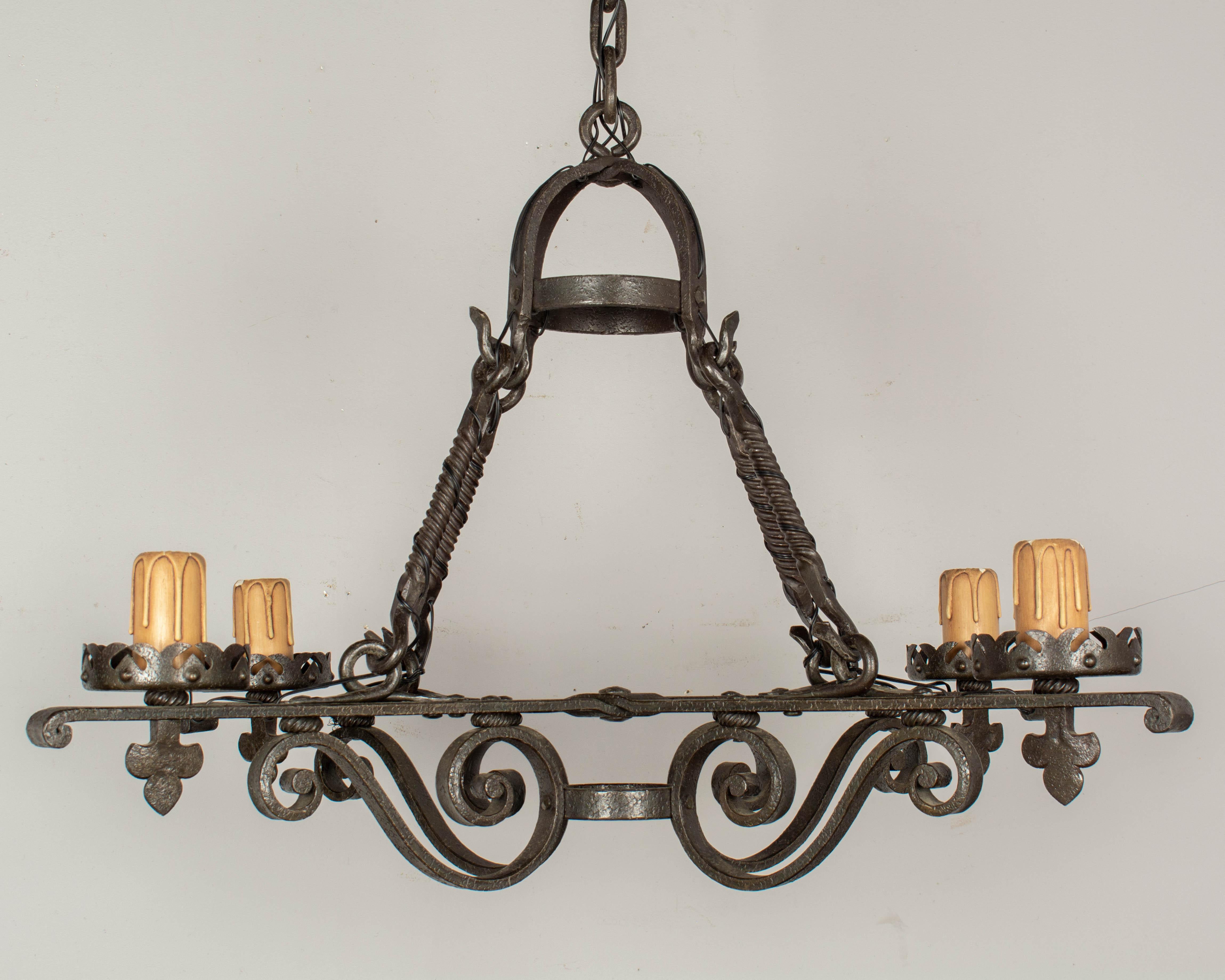Hand-Crafted French Art Deco Wrought Iron Chandelier For Sale