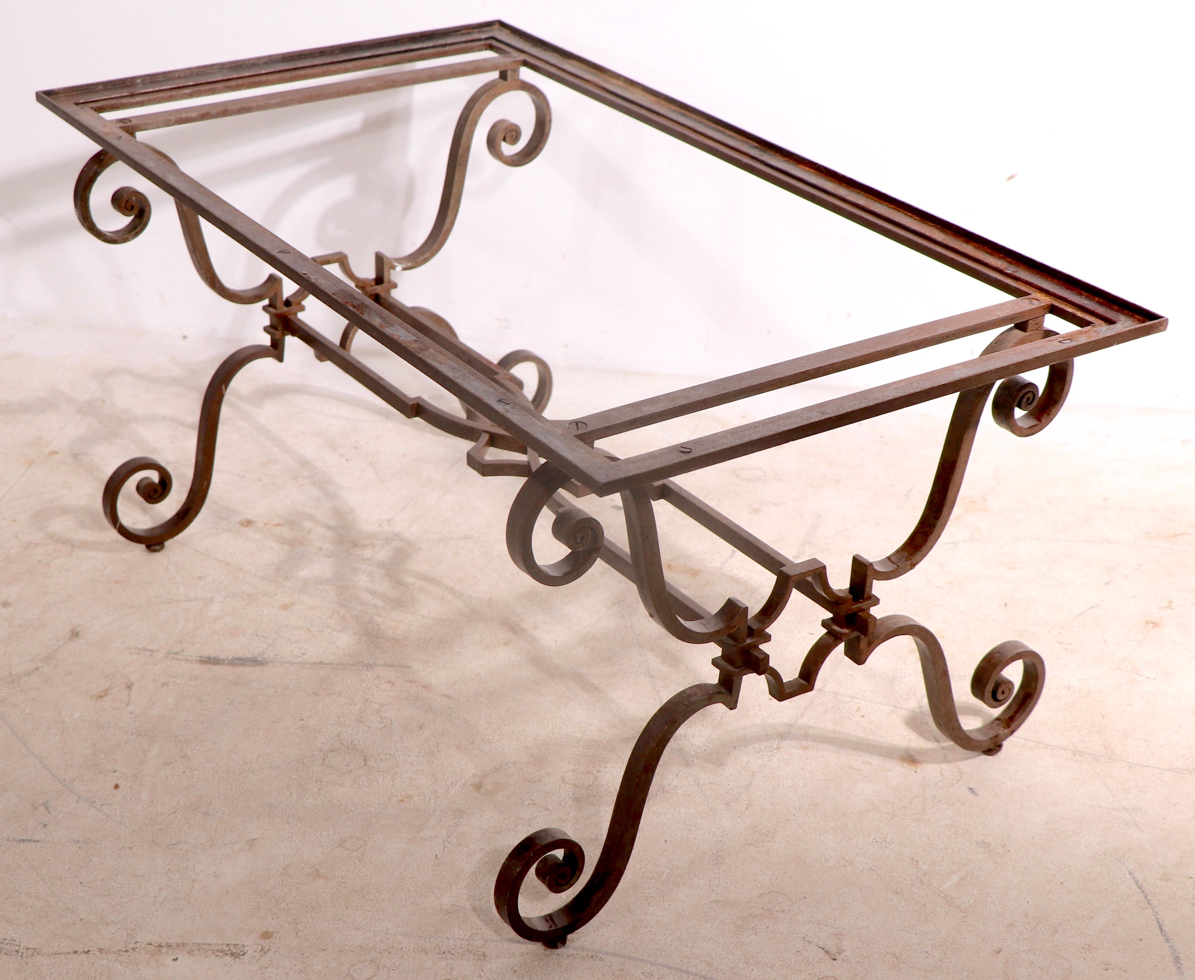 Exquisite Art Deco metal work table base, attributed to Raymond Subes. Heavy gauge metal stock, formed by a master craftsman, this example probably had a marble top, no longer present. The table base is in very good, original, untouched condition,