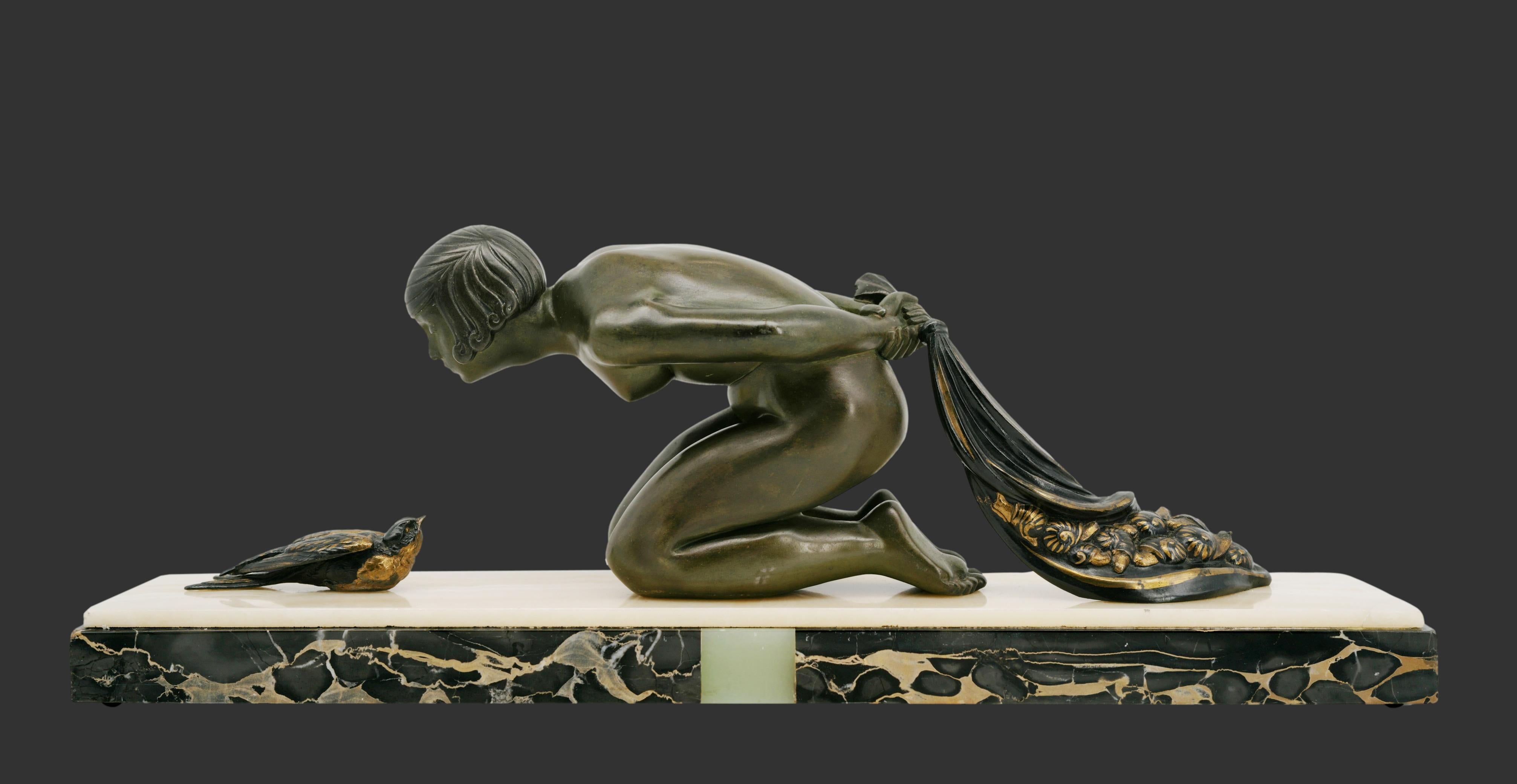French Art Deco sculpture by Limousin, France, 1920s. Young girl & partridge. The girl is holding a bag full of snails on her back. .Spelter, onyx and marble. Width : 22.8