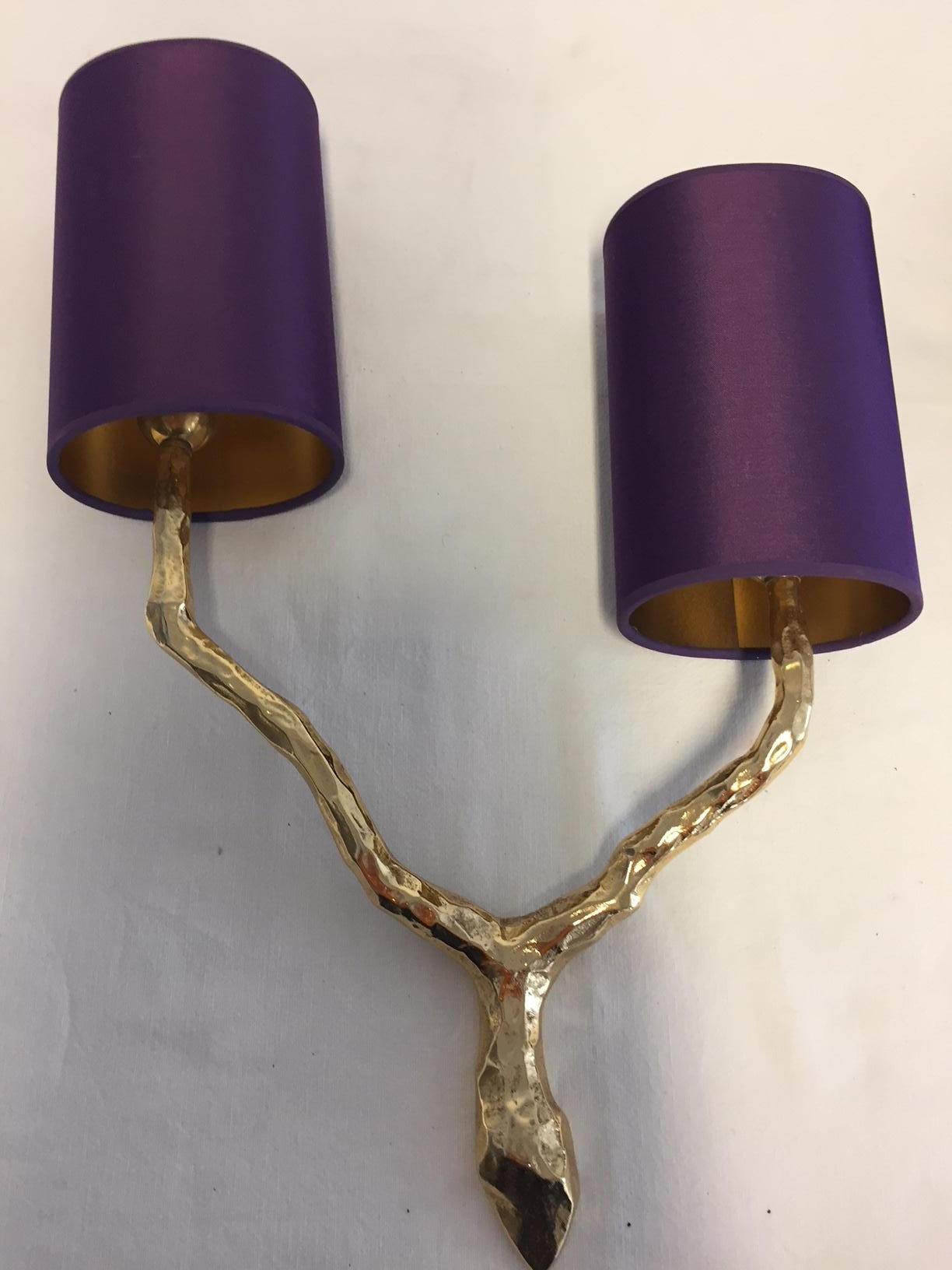 Pair of French art decorative bronze sconces by Maison Arlus from 1960.
Very good condition, wired in European standard, lamp shades in col. purple silk inside with glossy gold lining 
Price per SET

Measures: Height 51cm, width 25cm, depth 14cm.