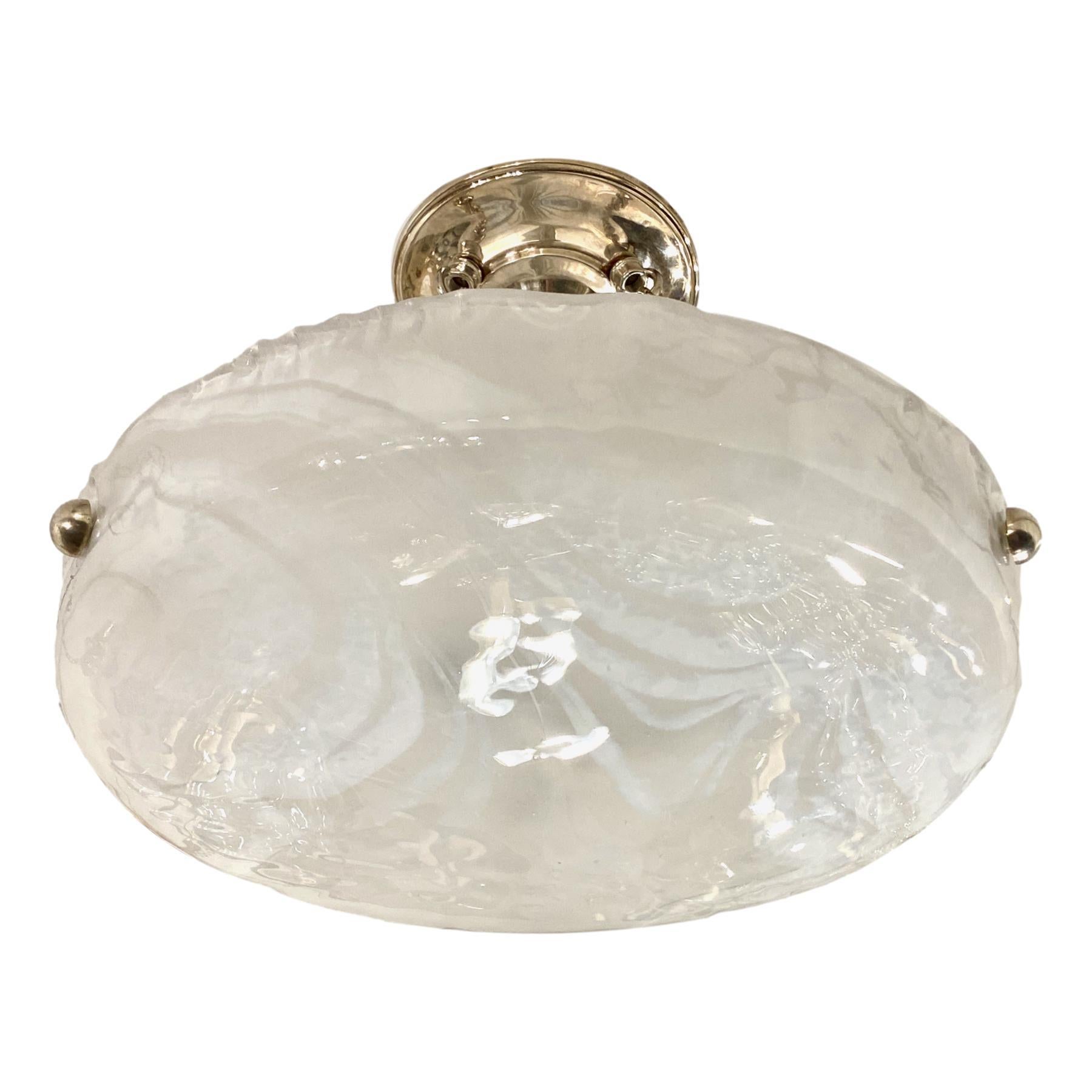 A circa 1960's blown white and clear art glass pendant light fixture with nickel-plated hardware and three interior lights.

Measurements:
Drop: 10