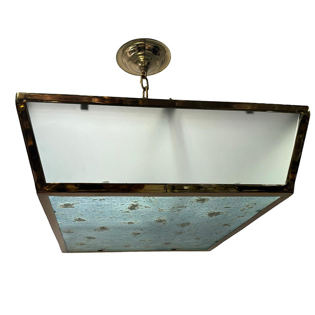 Luminaire italien des années 1960 avec insert en verre d'art et 6 lumières intérieures.

Mesures :
Profondeur : 24
Largeur : 26.5