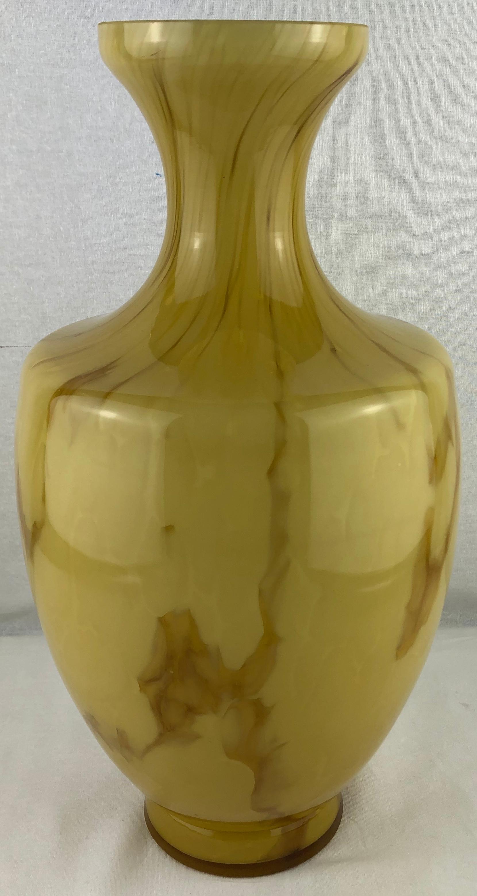 A tall hand blown art glass vase, mid-20th century, French.

This colorful decorative object will enhance any table, counter top or shelf in your home. 

     