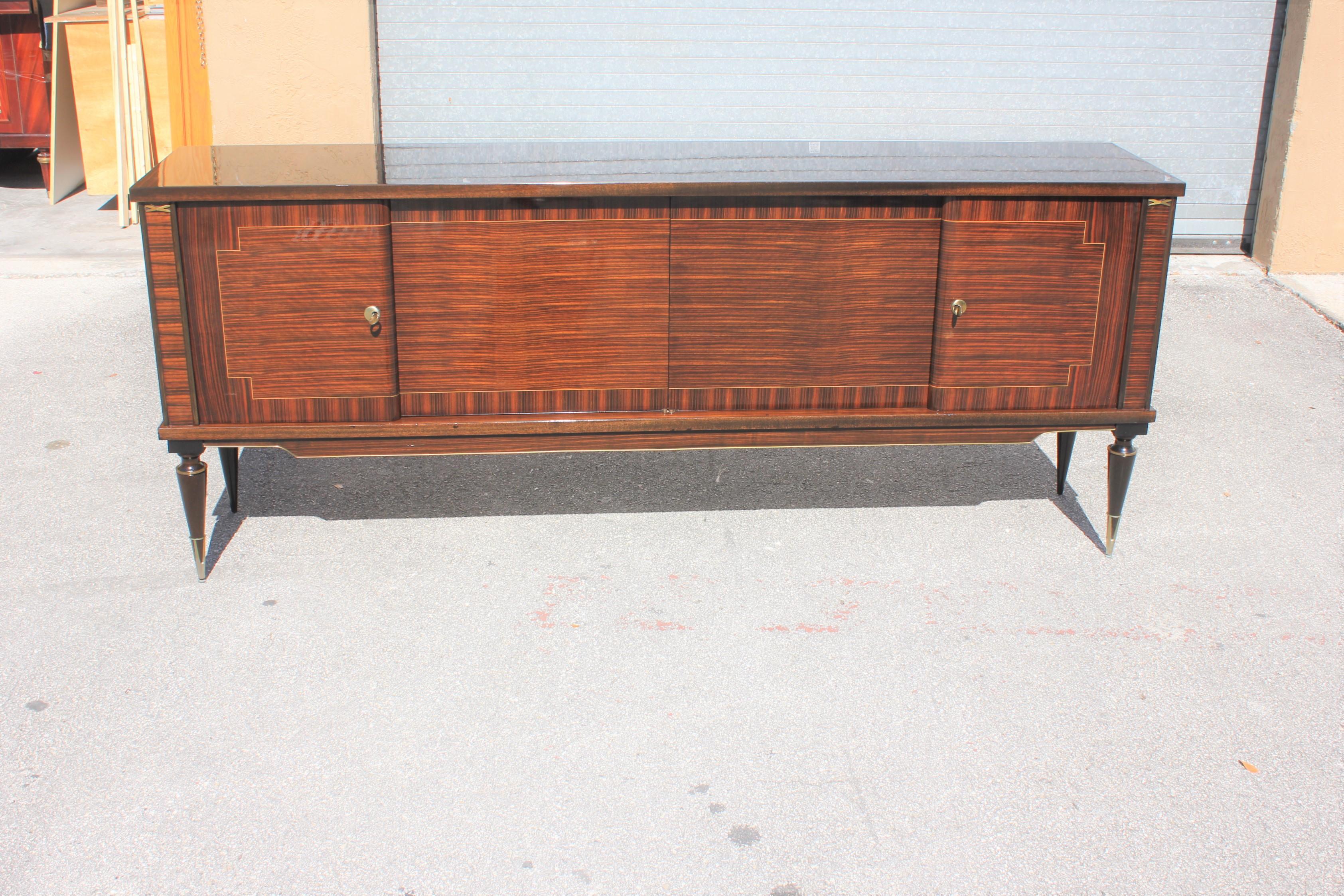 Classic French Art Deco Exotic Macassar ebony sideboard / buffet / bar, the sideboard are in very good condition ,with 2 drawers inside, and 2 shelves inside ,you can remove if you need more Space ,beautiful Bronze hardware detail ,Please note these