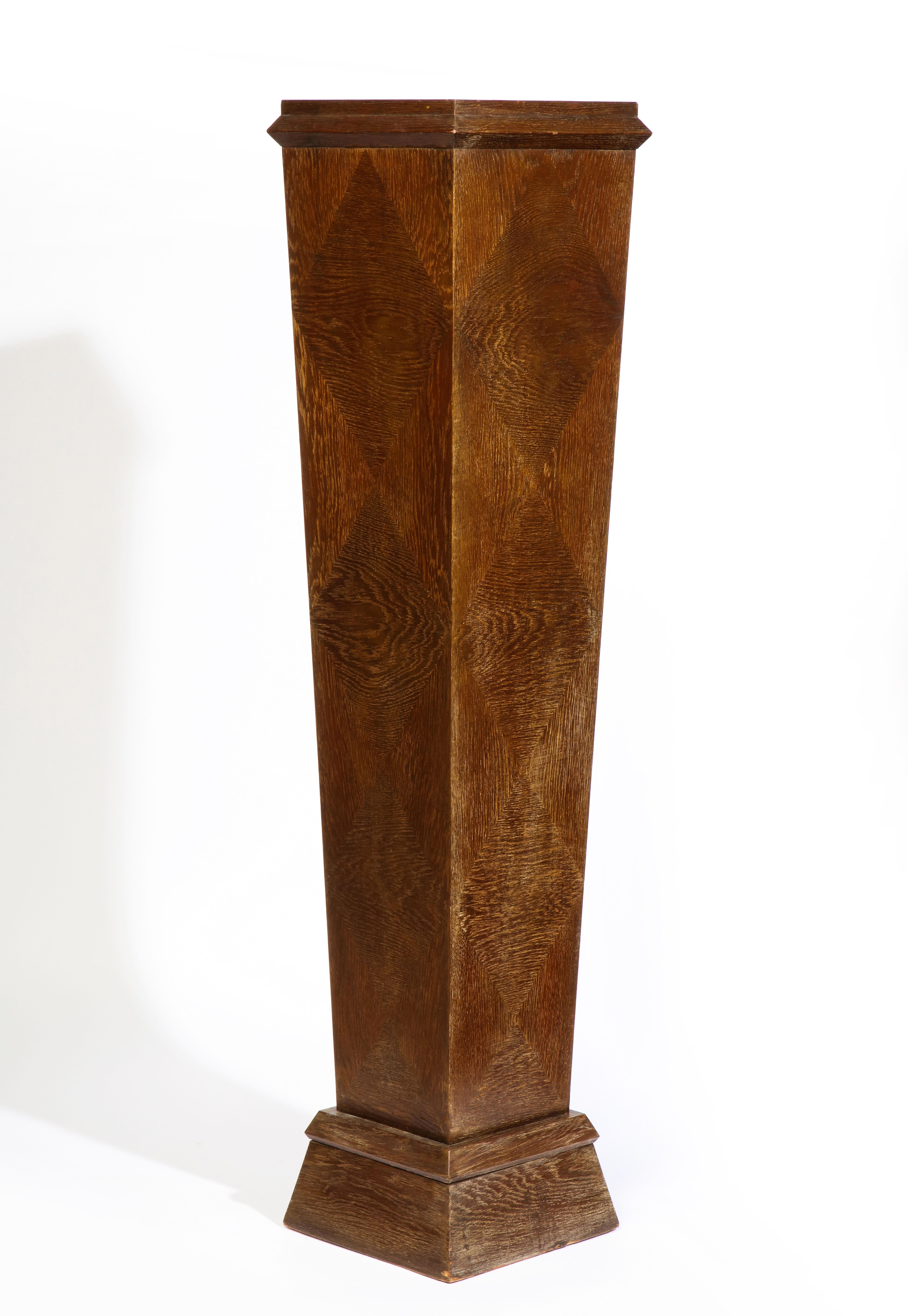 A modern French Art Moderne style cerused oak pedestal of square form.

The 'Art Moderne' style was conceived by designers who stripped Art Deco of its ornament in favor of a pure-line concept that allows for smooth, effortless design. Defined by