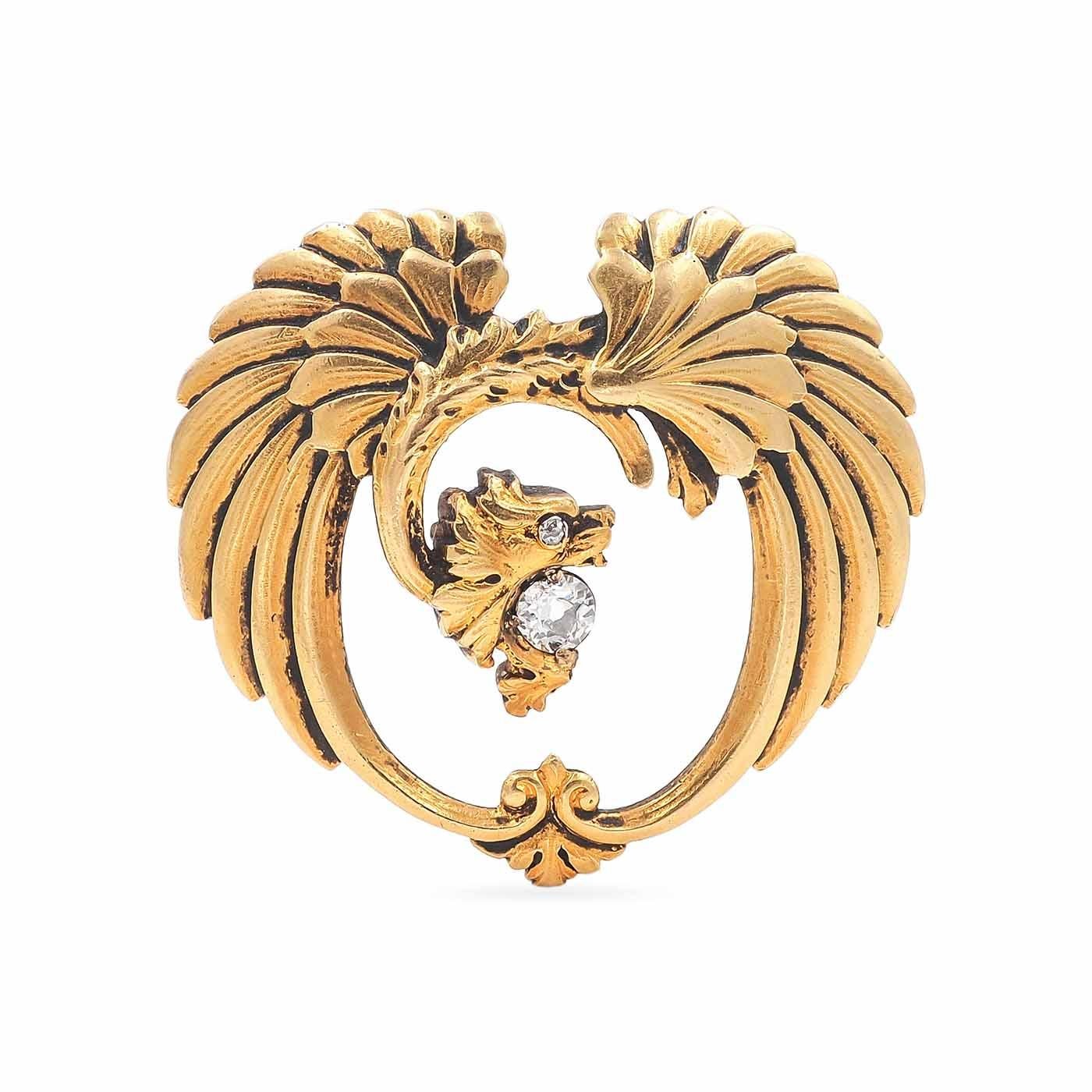 Art Nouveau era Dragon Pendant Necklace composed of 18k yellow gold. With an Old Mine Cut diamond in the dragon's mouth and one for its eye, for a total carat weight of 0.23 carats. Clasped on a contemporary 14k yellow gold chain that opens at both