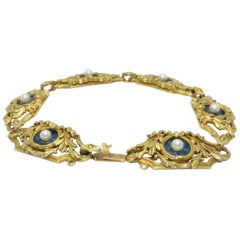 Antique French Art Nouveau 18 Karat Gold Enamel and Pearl Floral Motif Bracelet