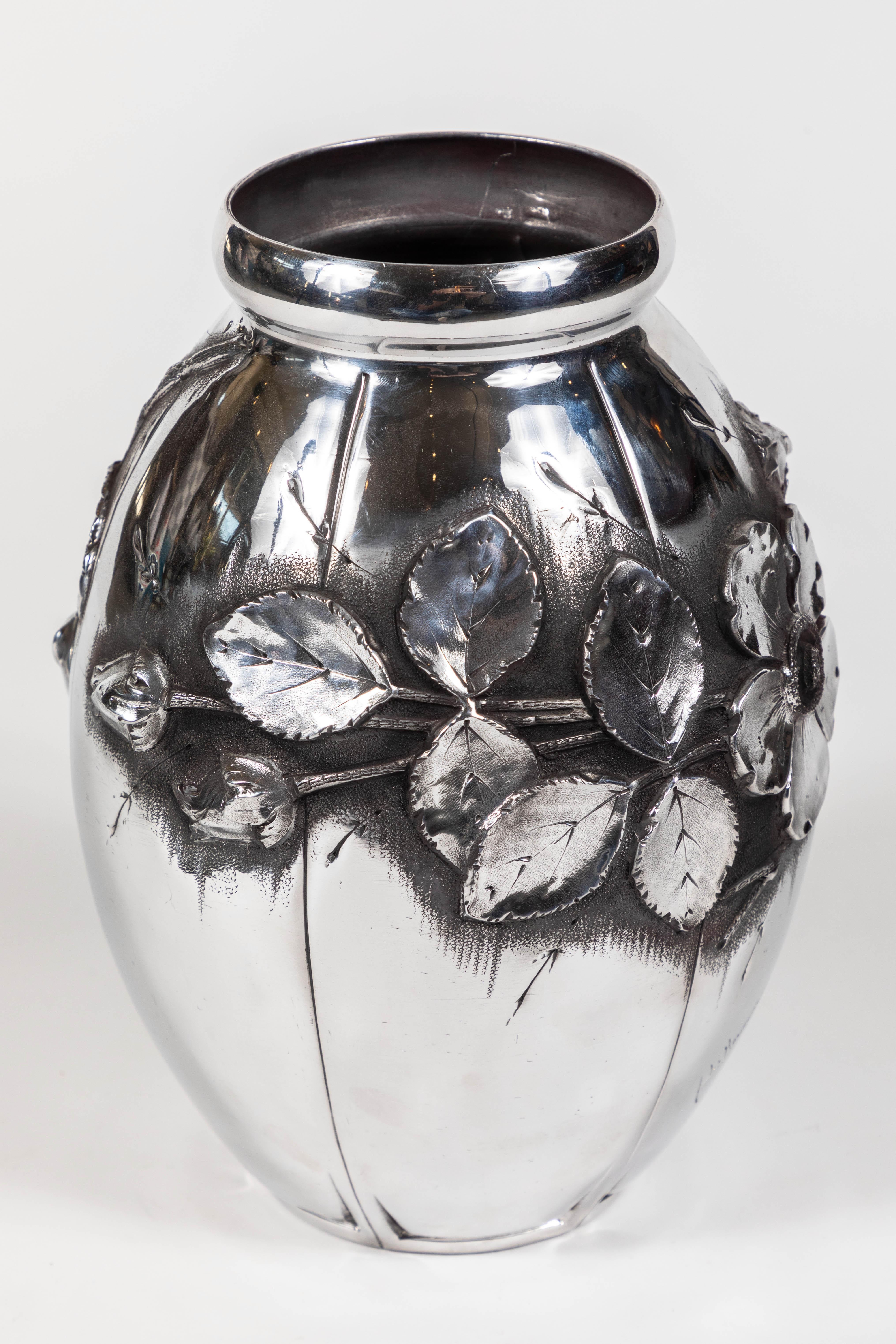 French Art Nouveau aluminum vase by L. Houzeaux, newly polished.

Signed by the Artist and stamped:

Metal D'Art
Cisele'
Main.
 
Du Chevalier.